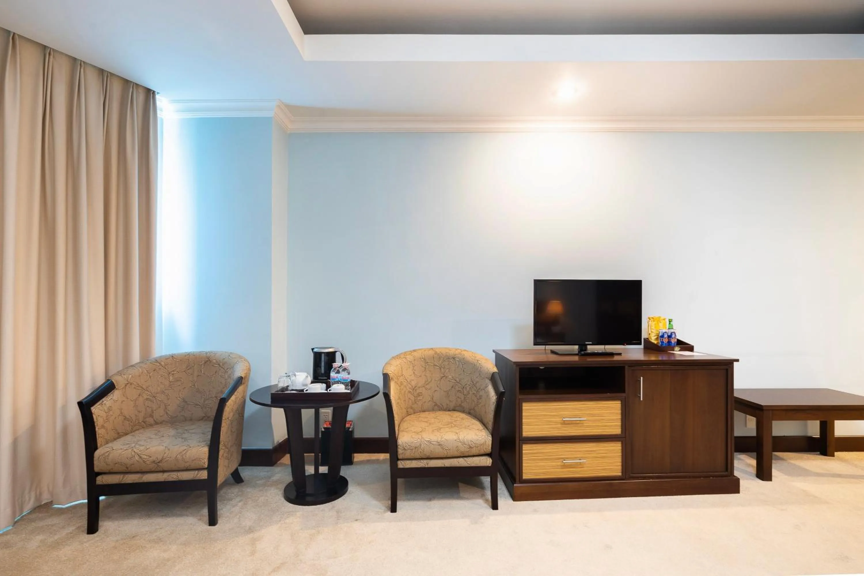 Communal lounge/ TV room in PHU MY HARBOUR HOTEL - Old Golf Phu My Hotel