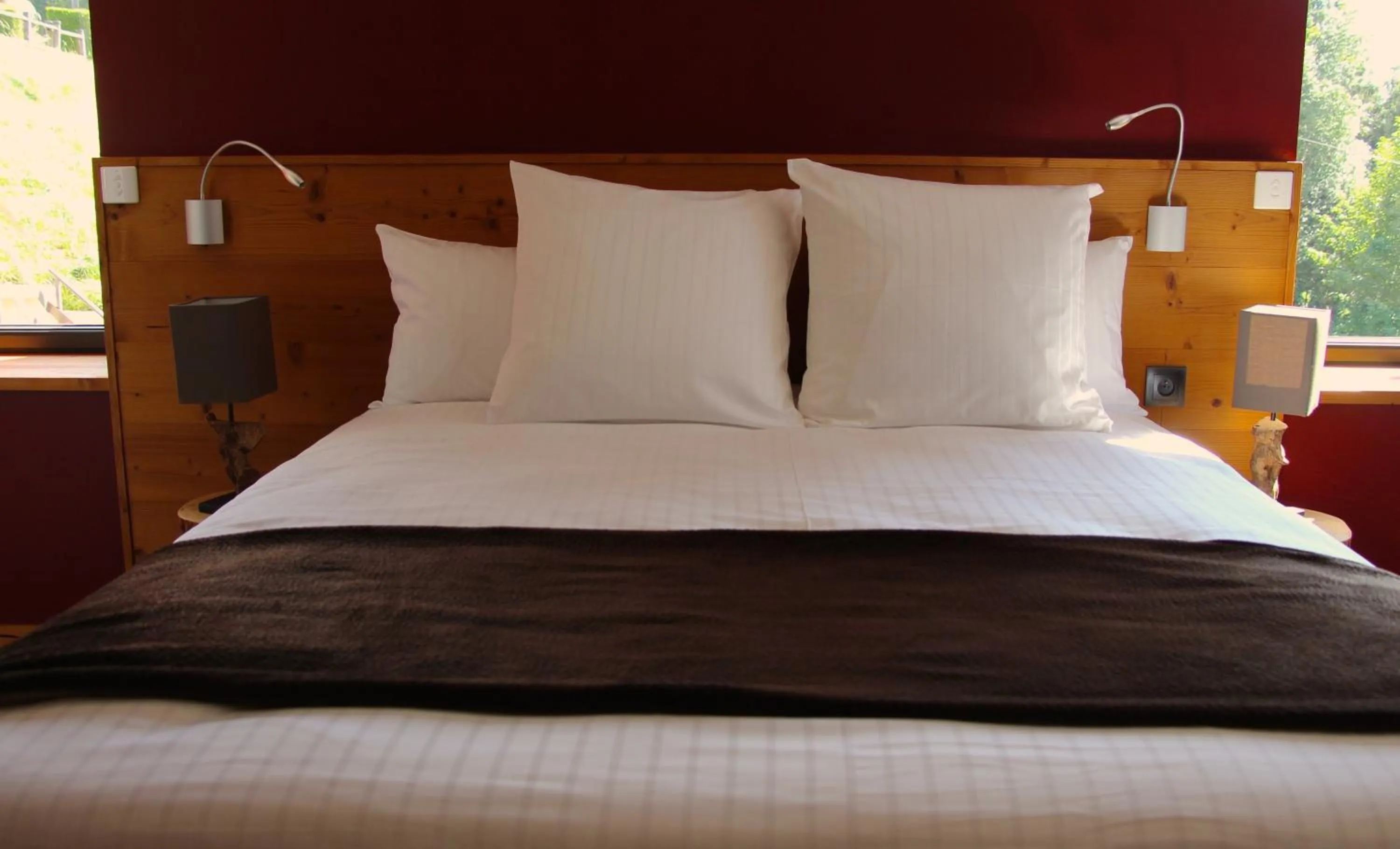 Bed in Hôtel L'Atelier de Donat