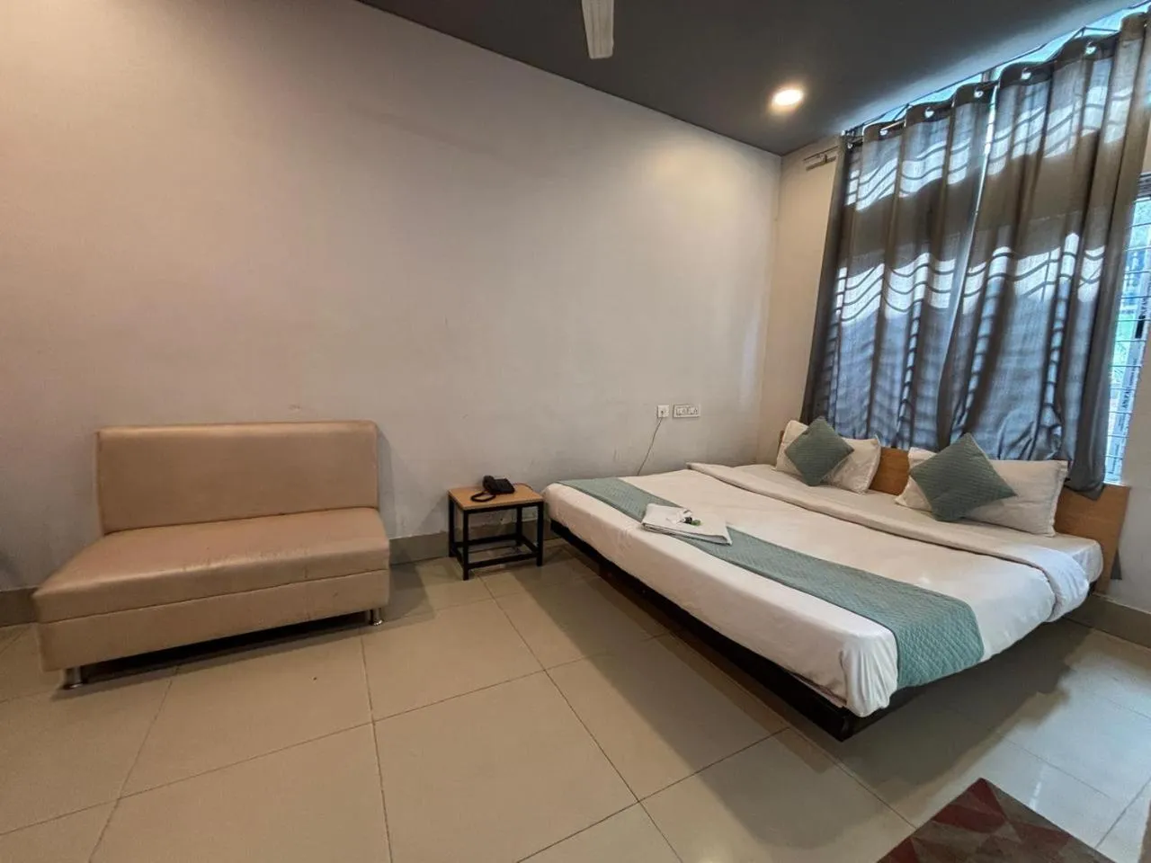 Bed in Hotel Aditya Guwahati