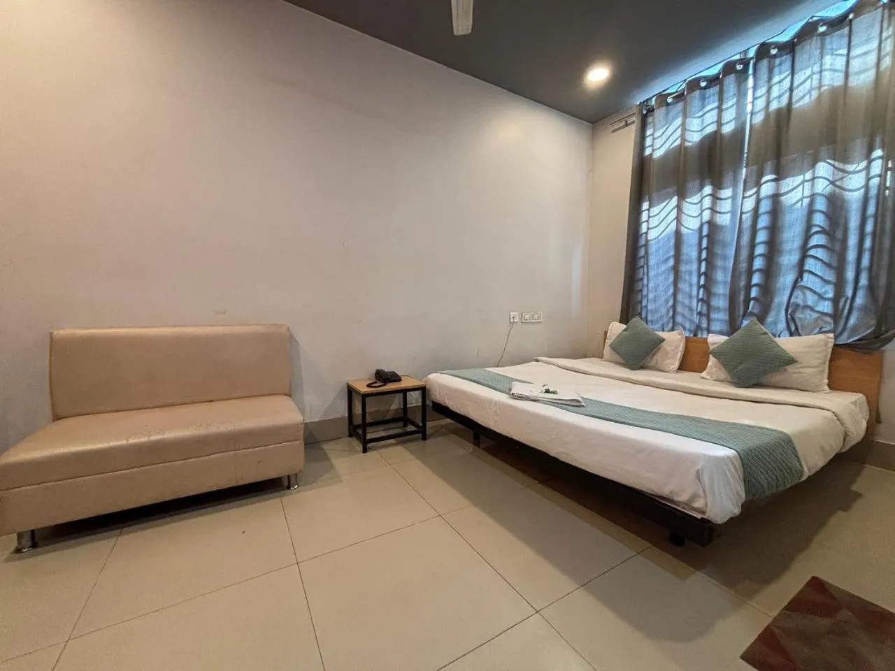 Bed in Hotel Aditya Guwahati