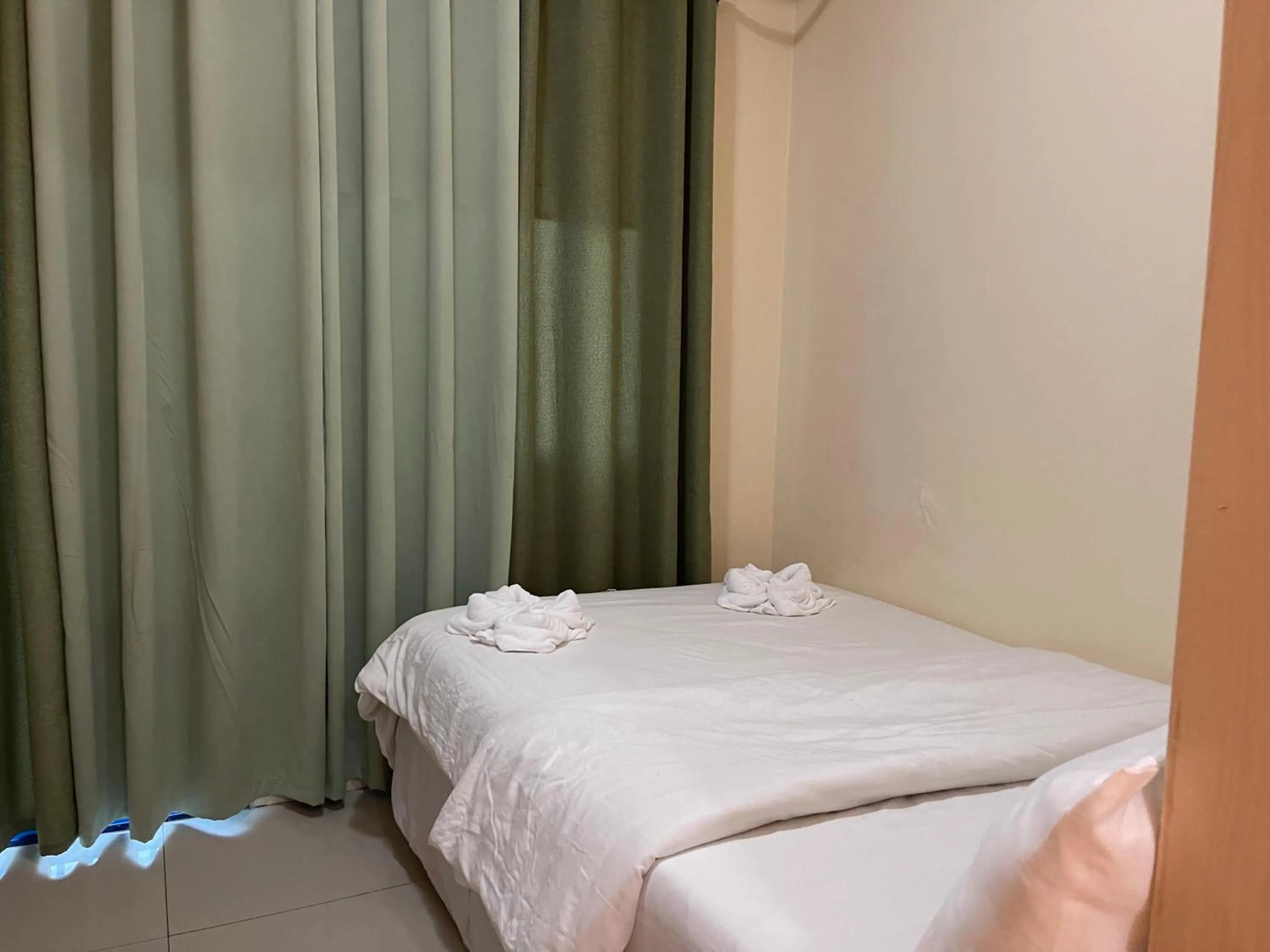 Bed in Premiere Haven MOA Staycation