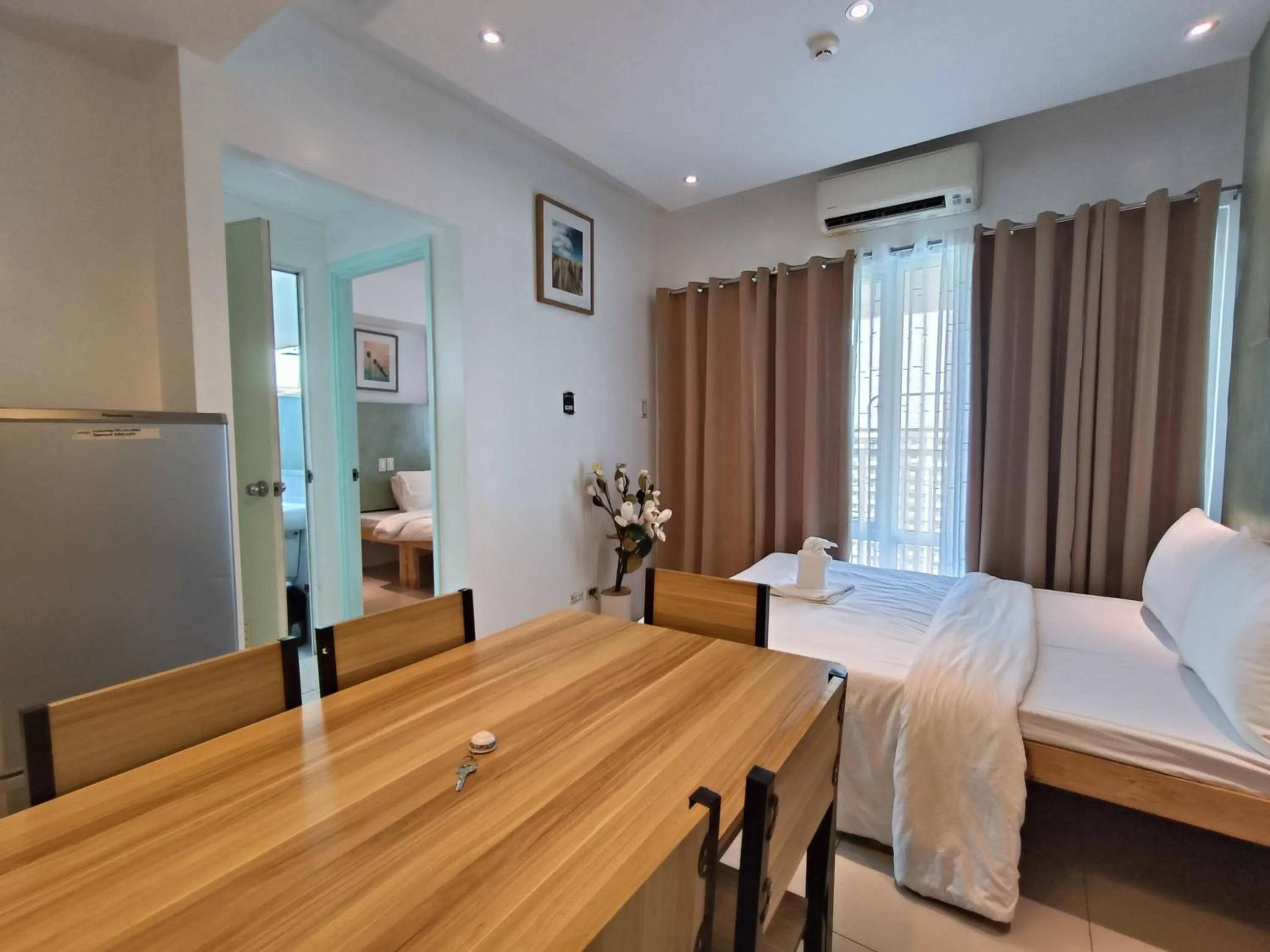 Bed in Premiere Haven MOA Staycation