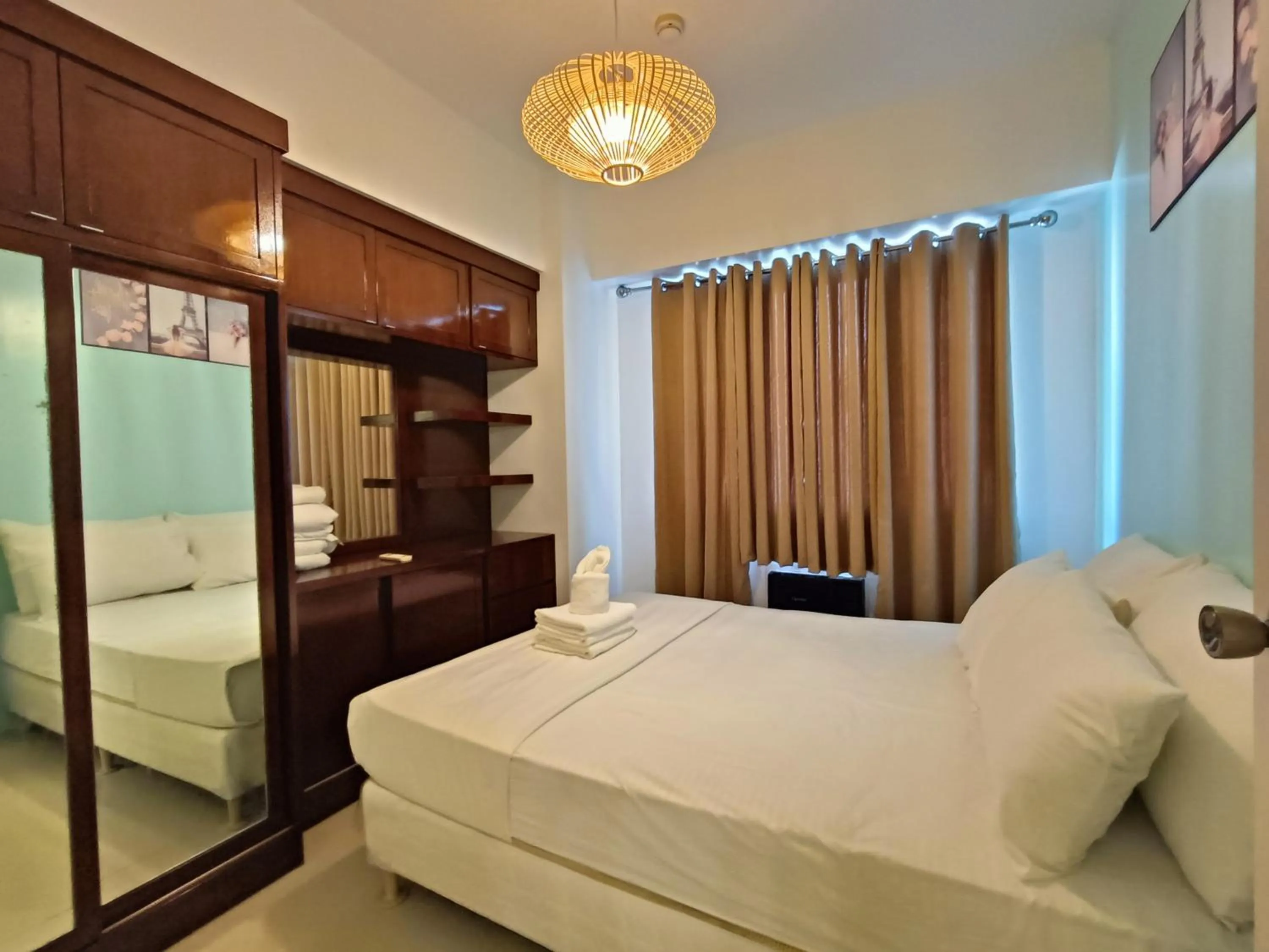 Bed in Premiere Haven MOA Staycation