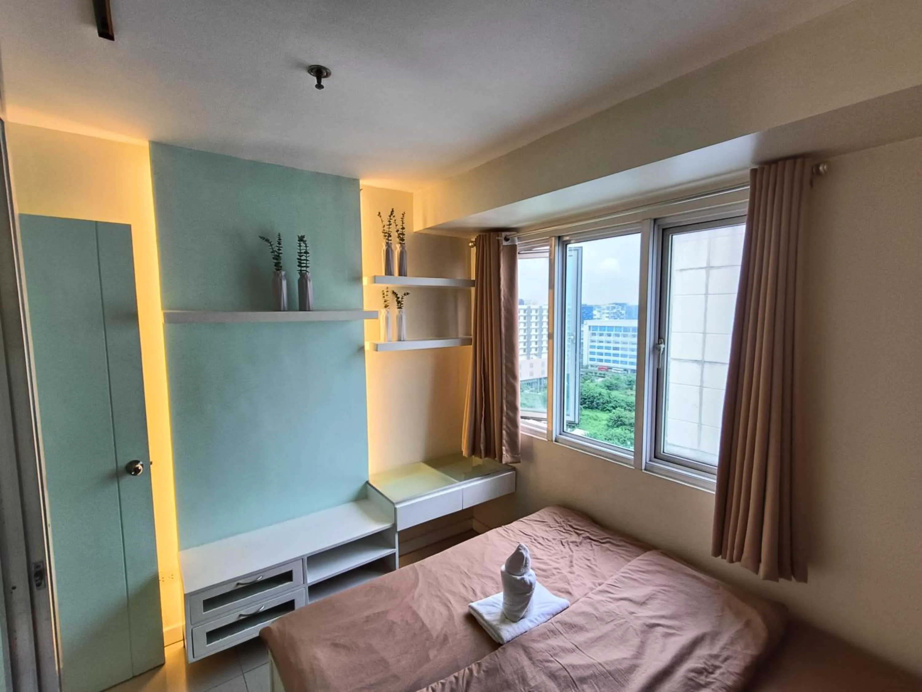 Bed in Premiere Haven MOA Staycation