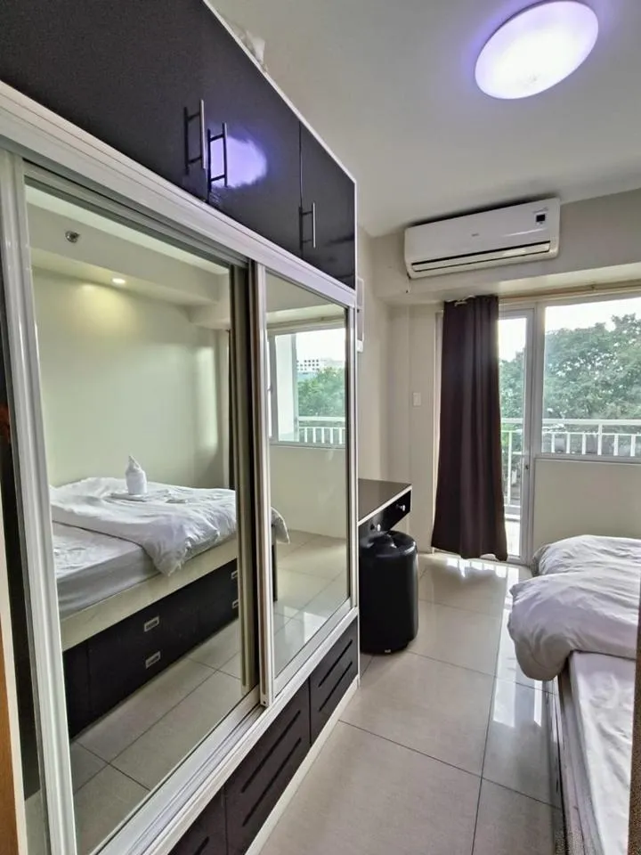 Bed in Premiere Haven MOA Staycation