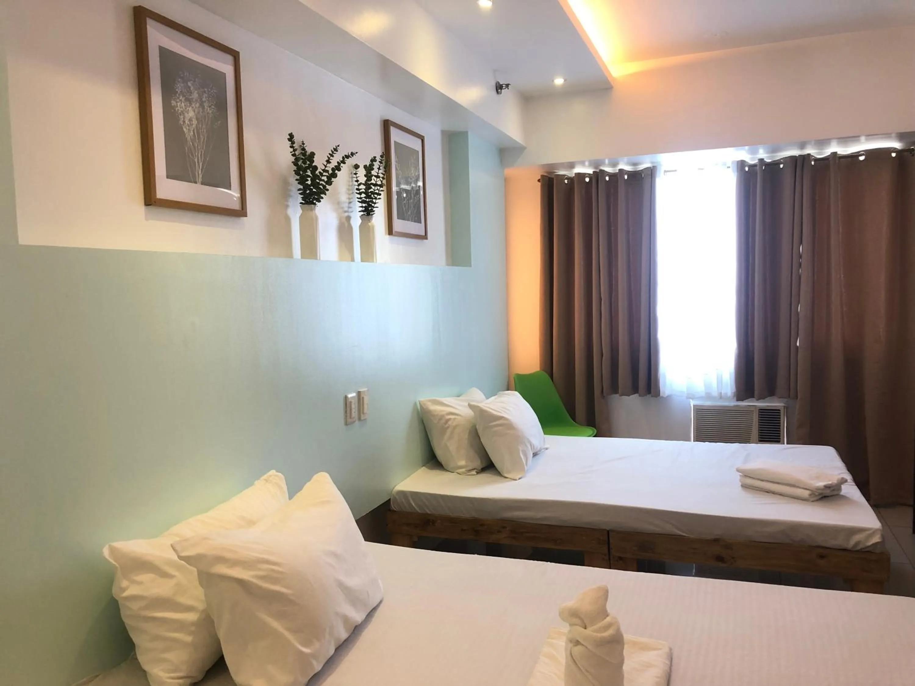 Bed in Premiere Haven MOA Staycation