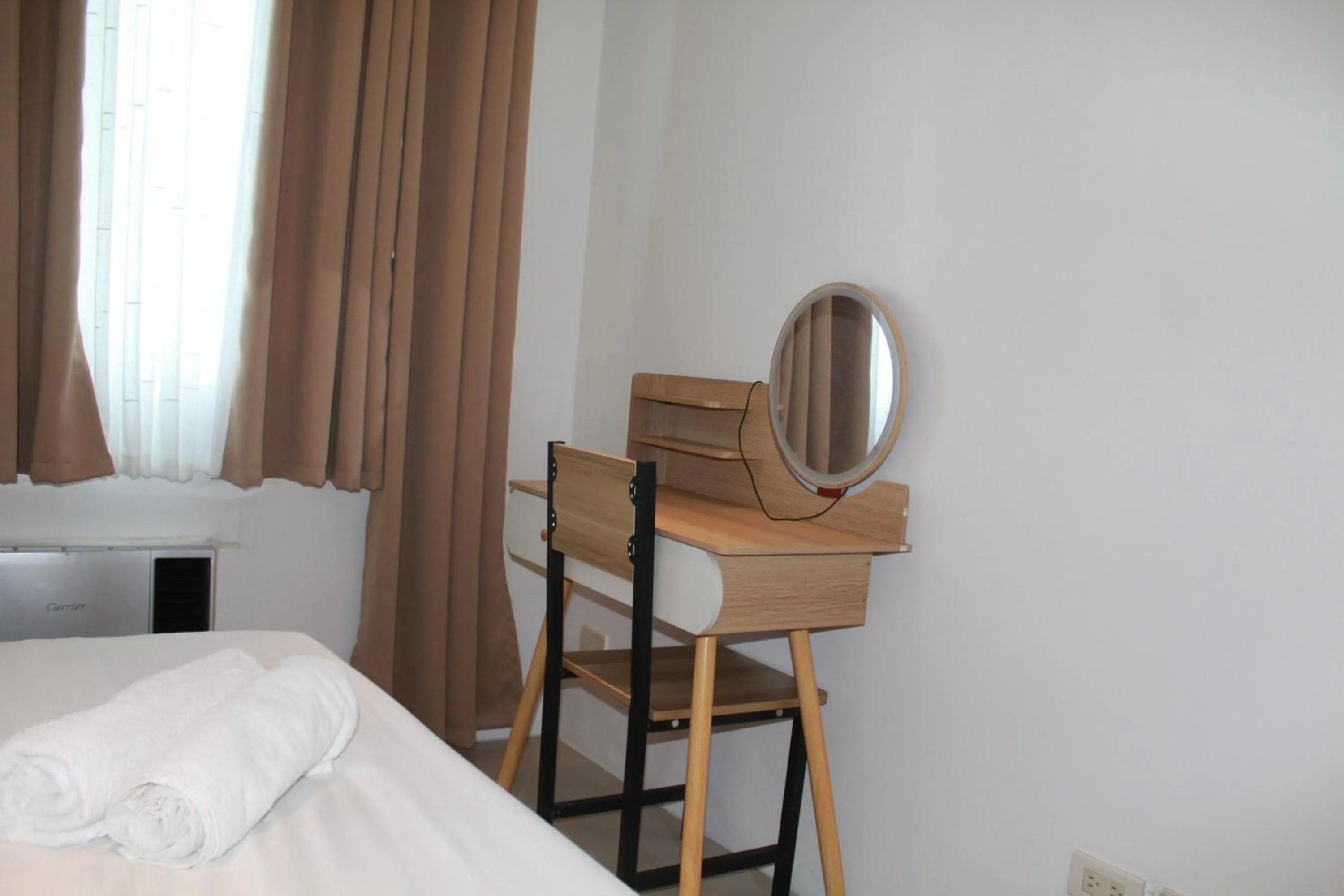 Bed in Premiere Haven MOA Staycation