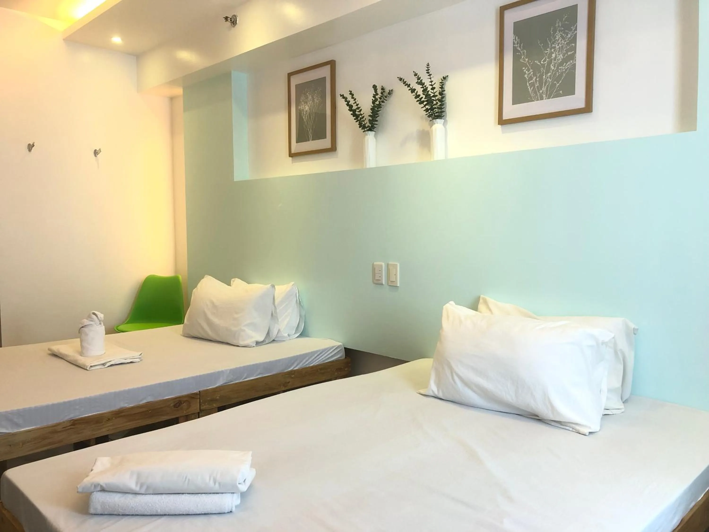 Bed in Premiere Haven MOA Staycation