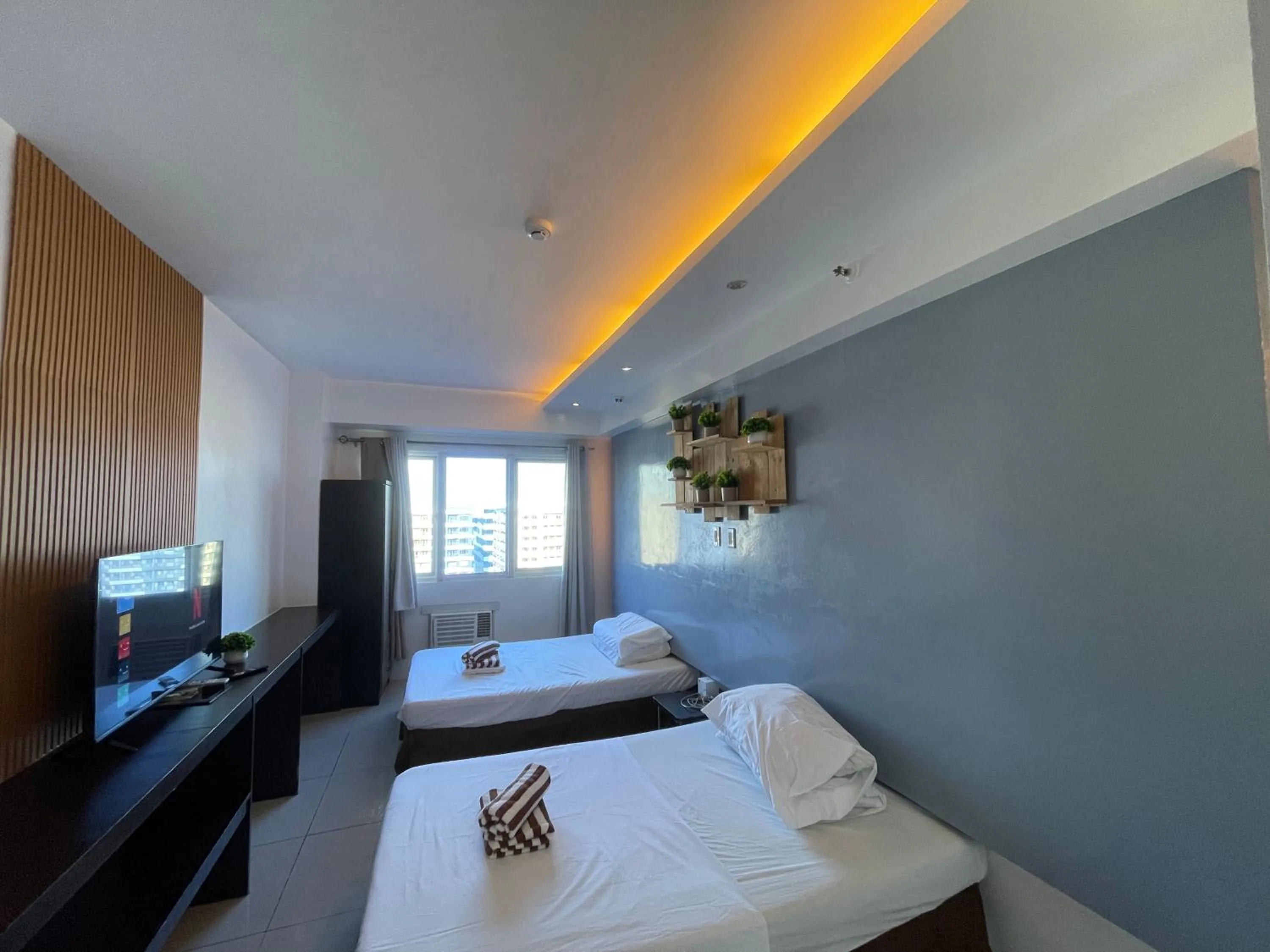 Bed in Premiere Haven MOA Staycation