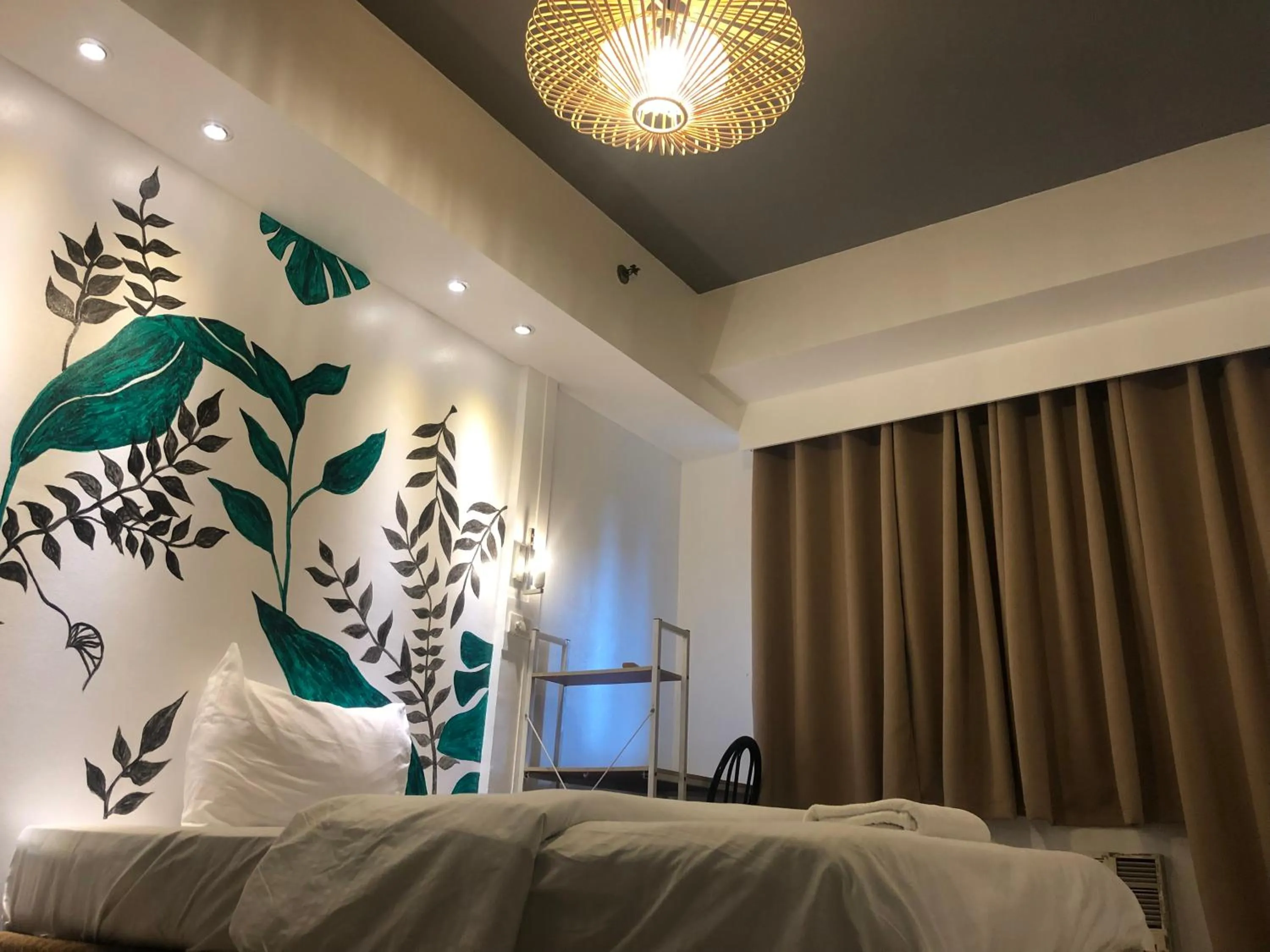 Bed in Premiere Haven MOA Staycation