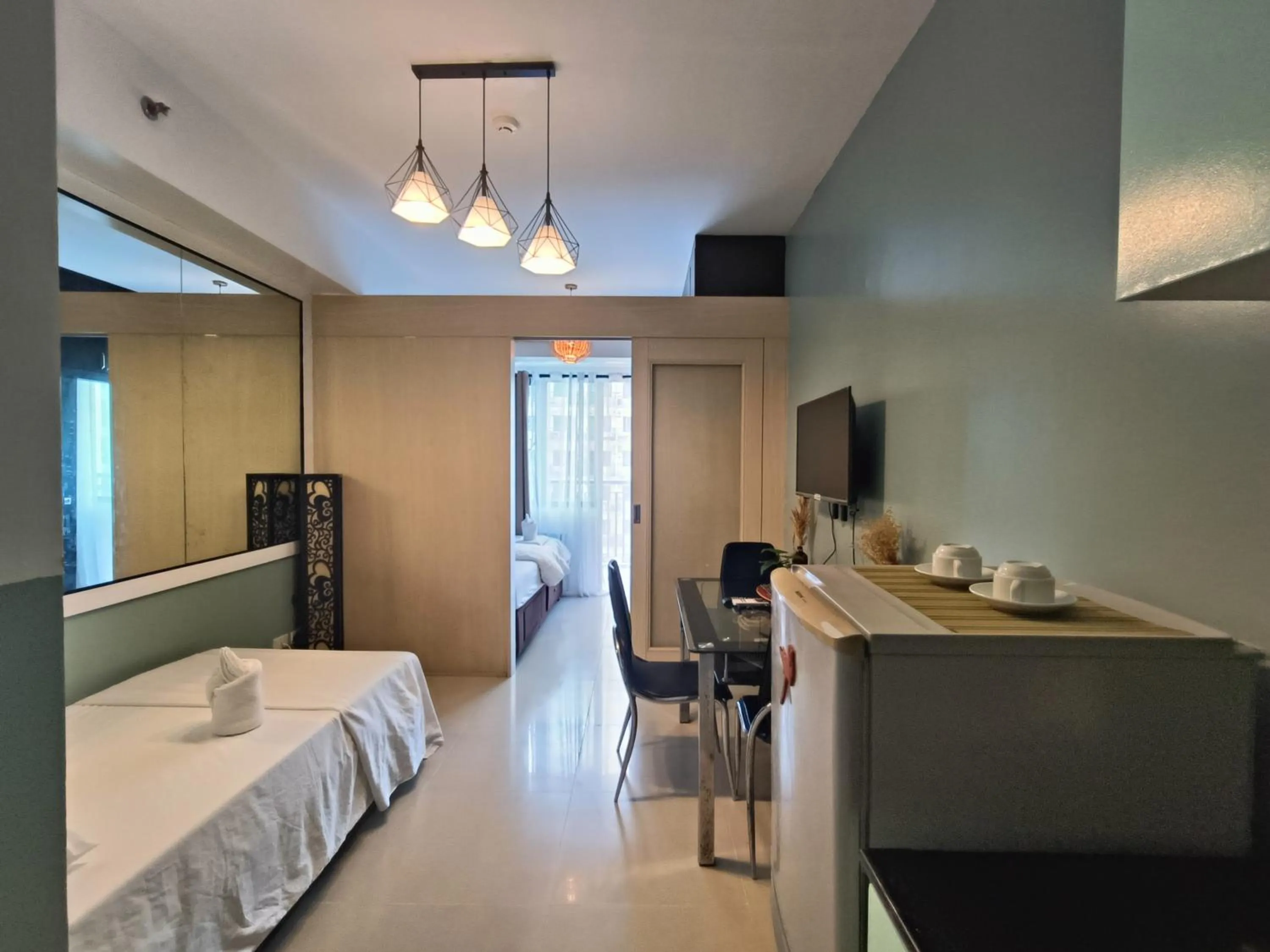 Bed in Premiere Haven MOA Staycation