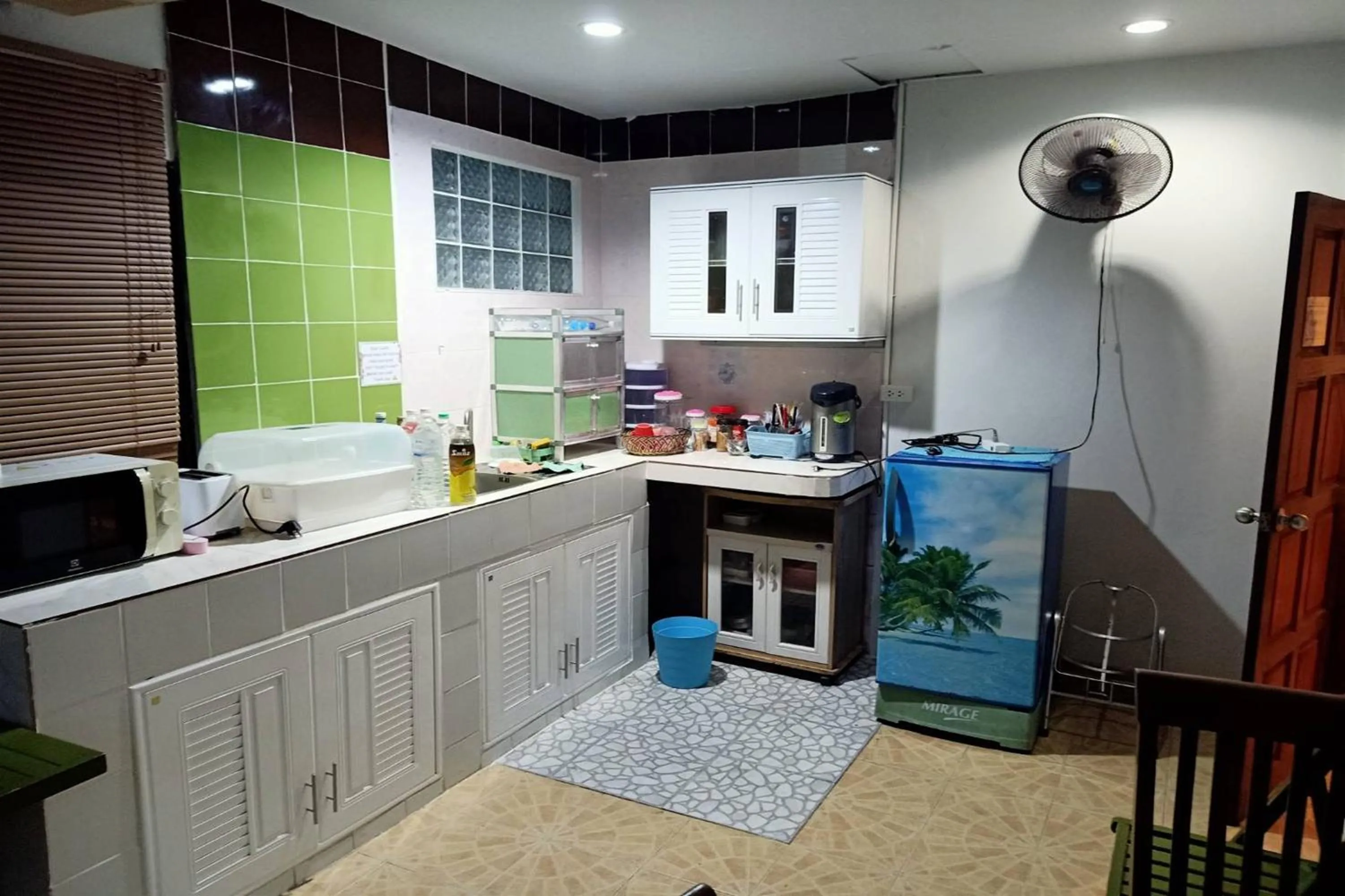 Kitchen or kitchenette in Kamala Orchid Guesthouse