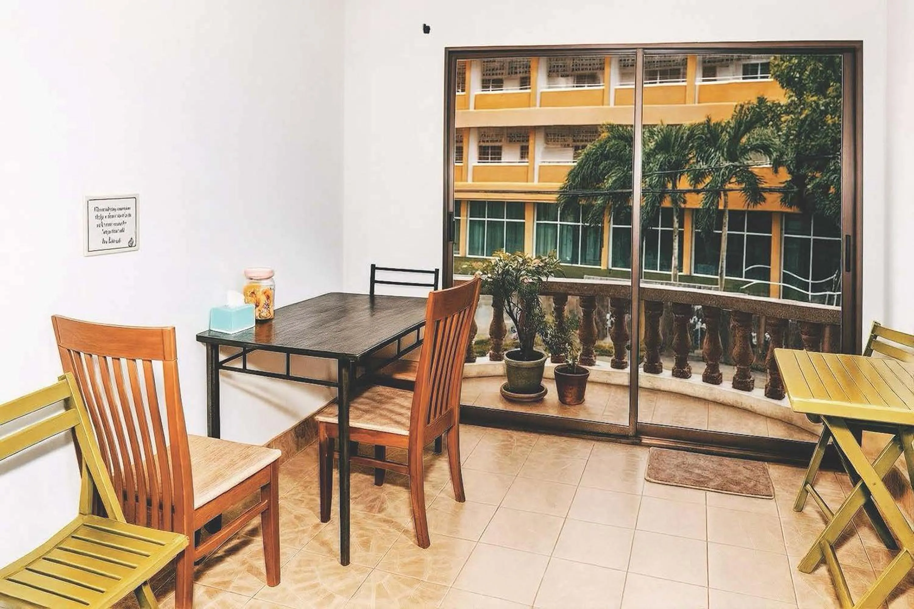 Seating area in Kamala Orchid Guesthouse