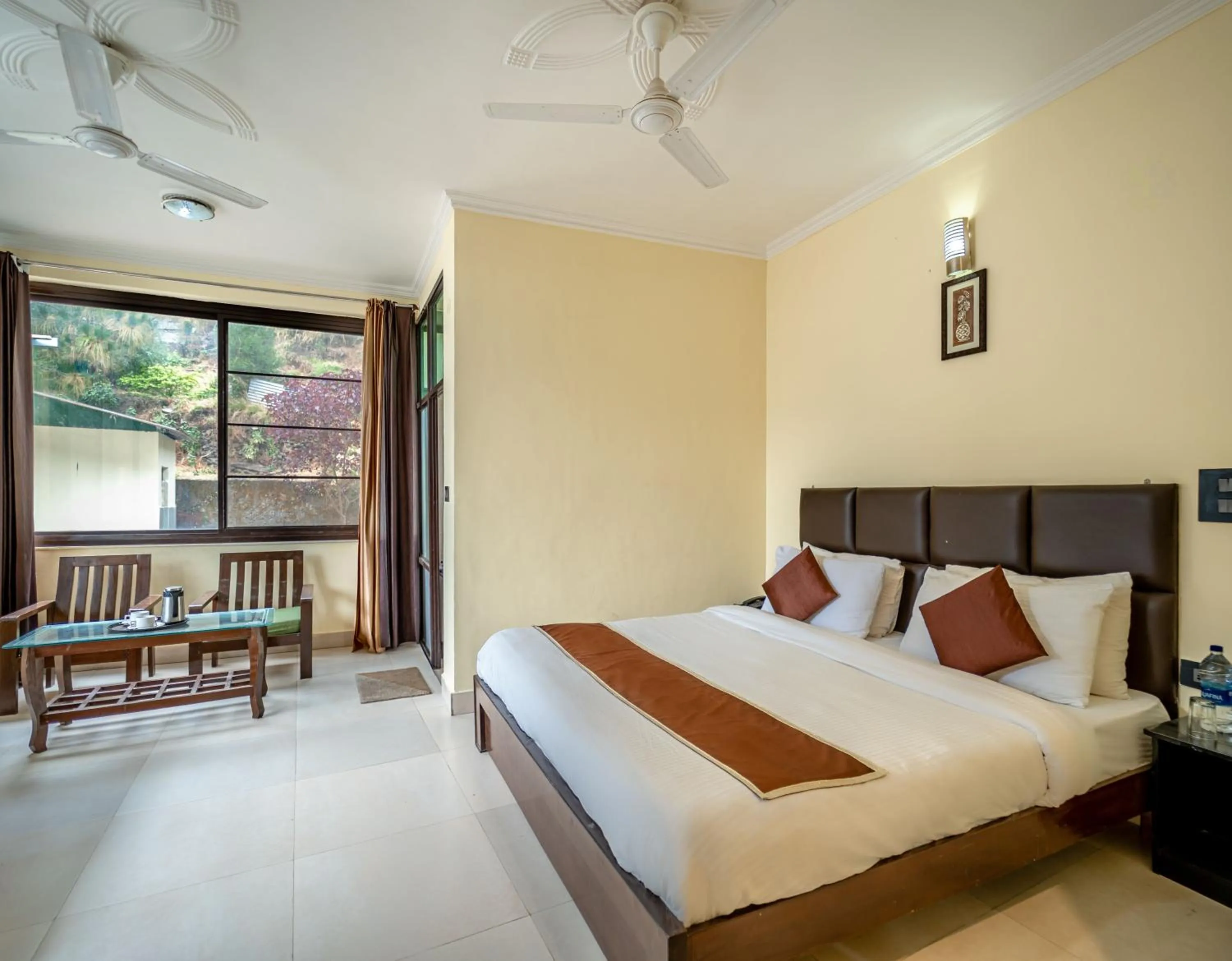 Bed in Flutter Hotels & Resort