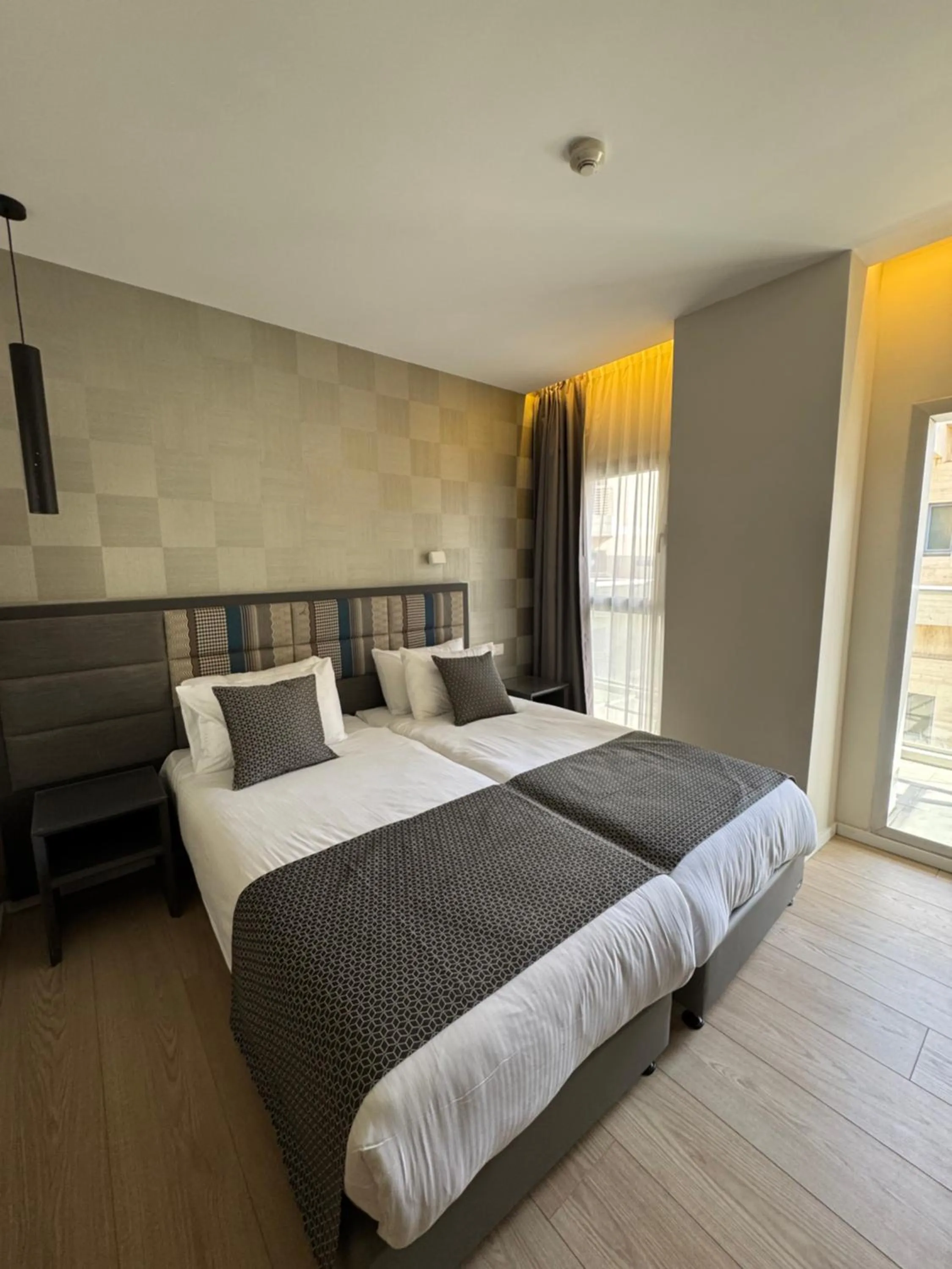 Bed in Abratel Sea View