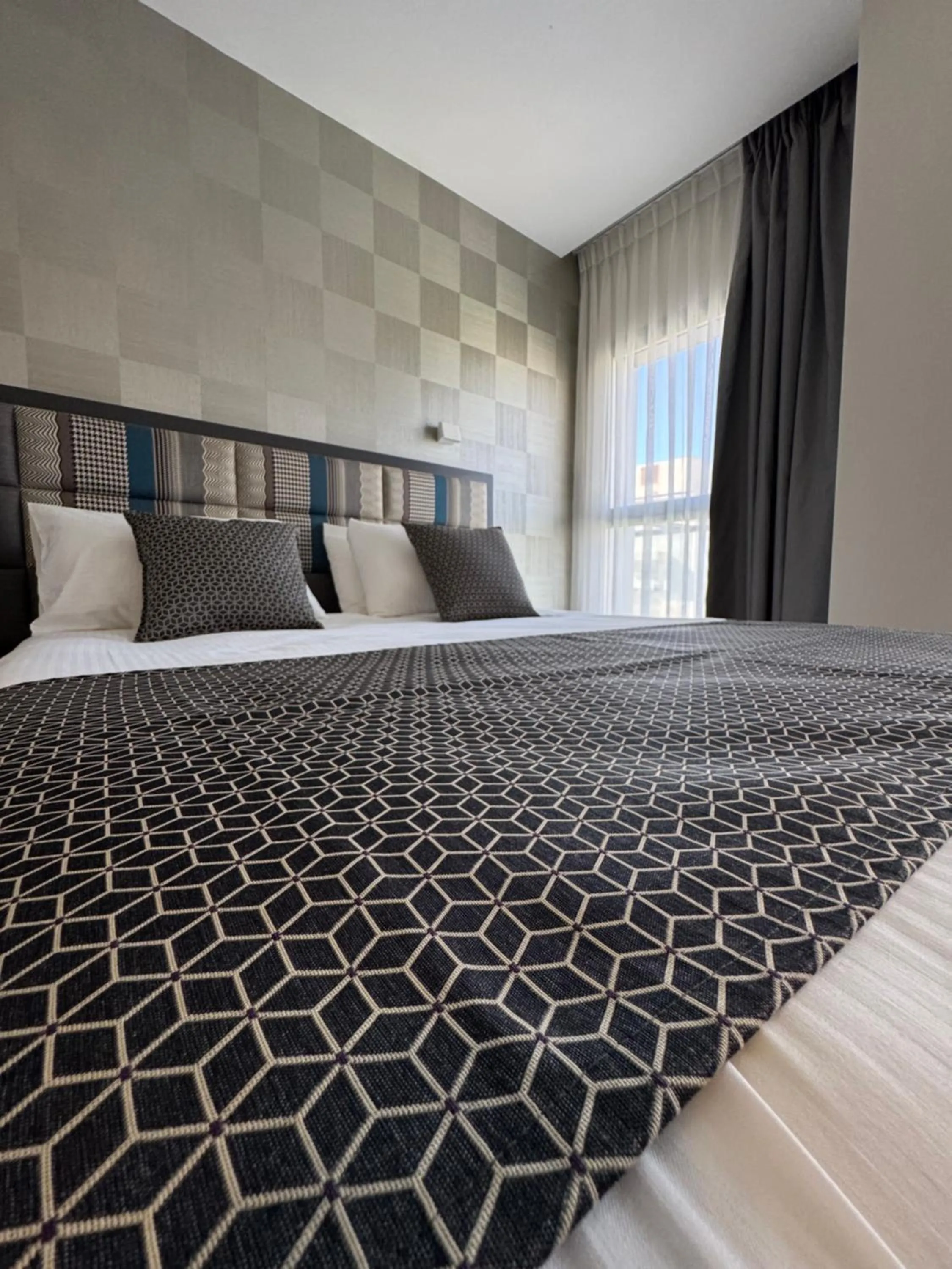 Bed in Abratel Sea View