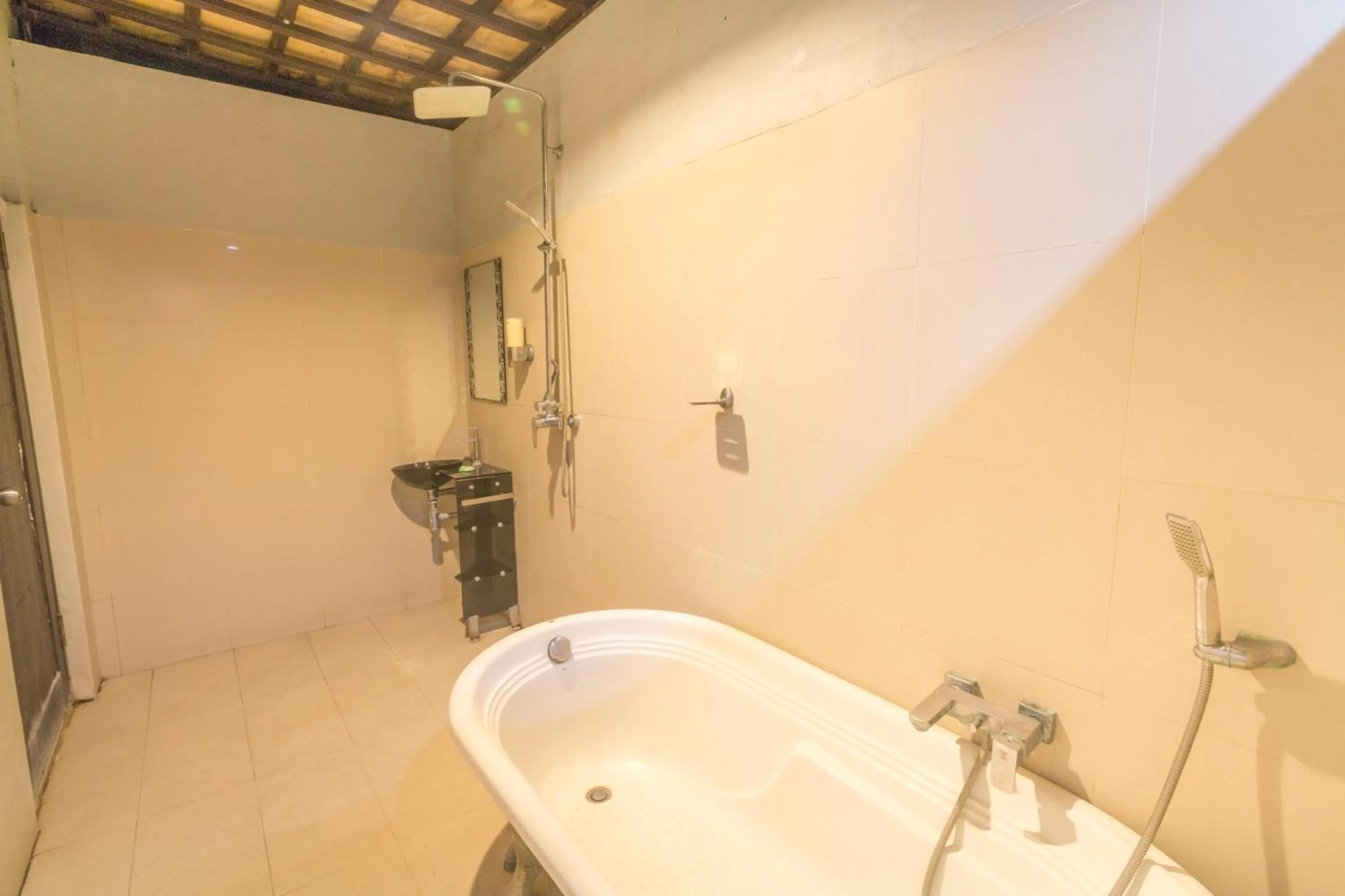 Bathroom in JM Hotel Kuta Lombok