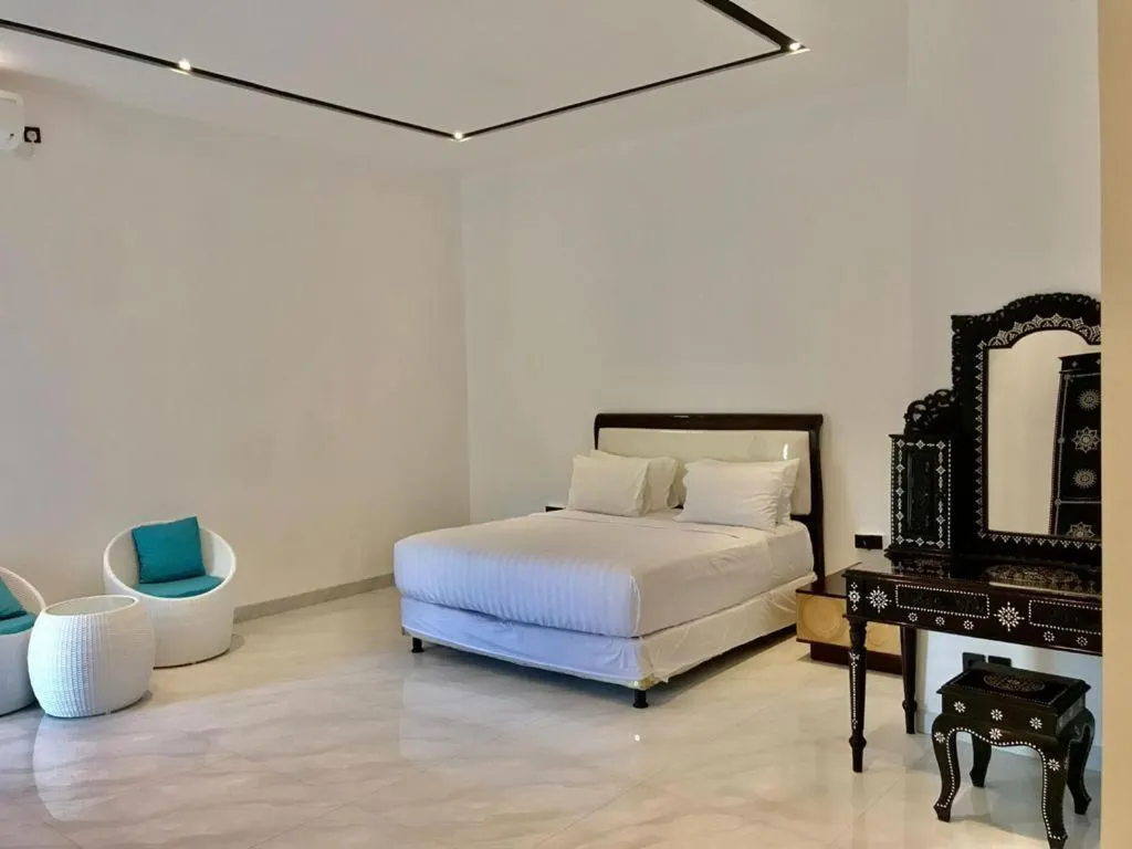 Bed in JM Hotel Kuta Lombok