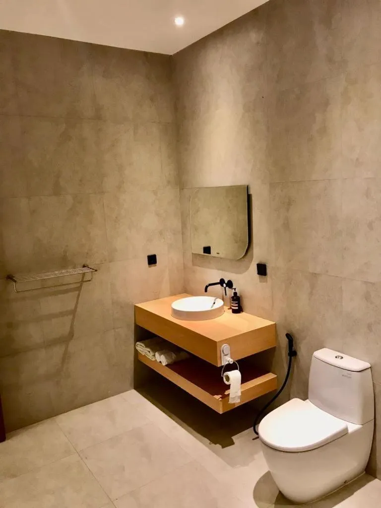 Bathroom in JM Hotel Kuta Lombok