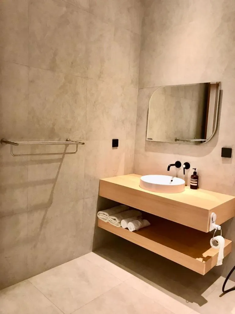 Bathroom in JM Hotel Kuta Lombok