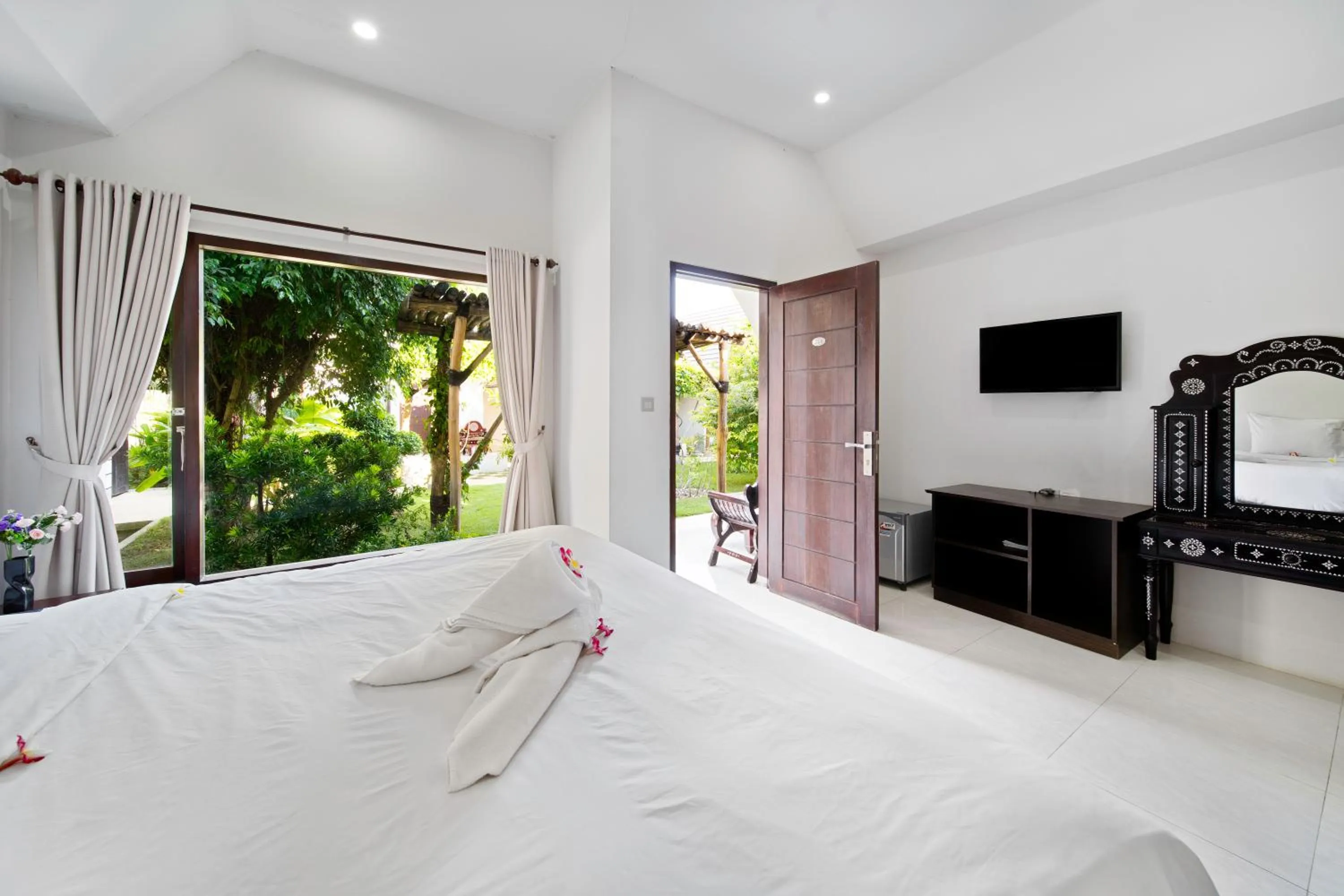 Bed in JM Hotel Kuta Lombok