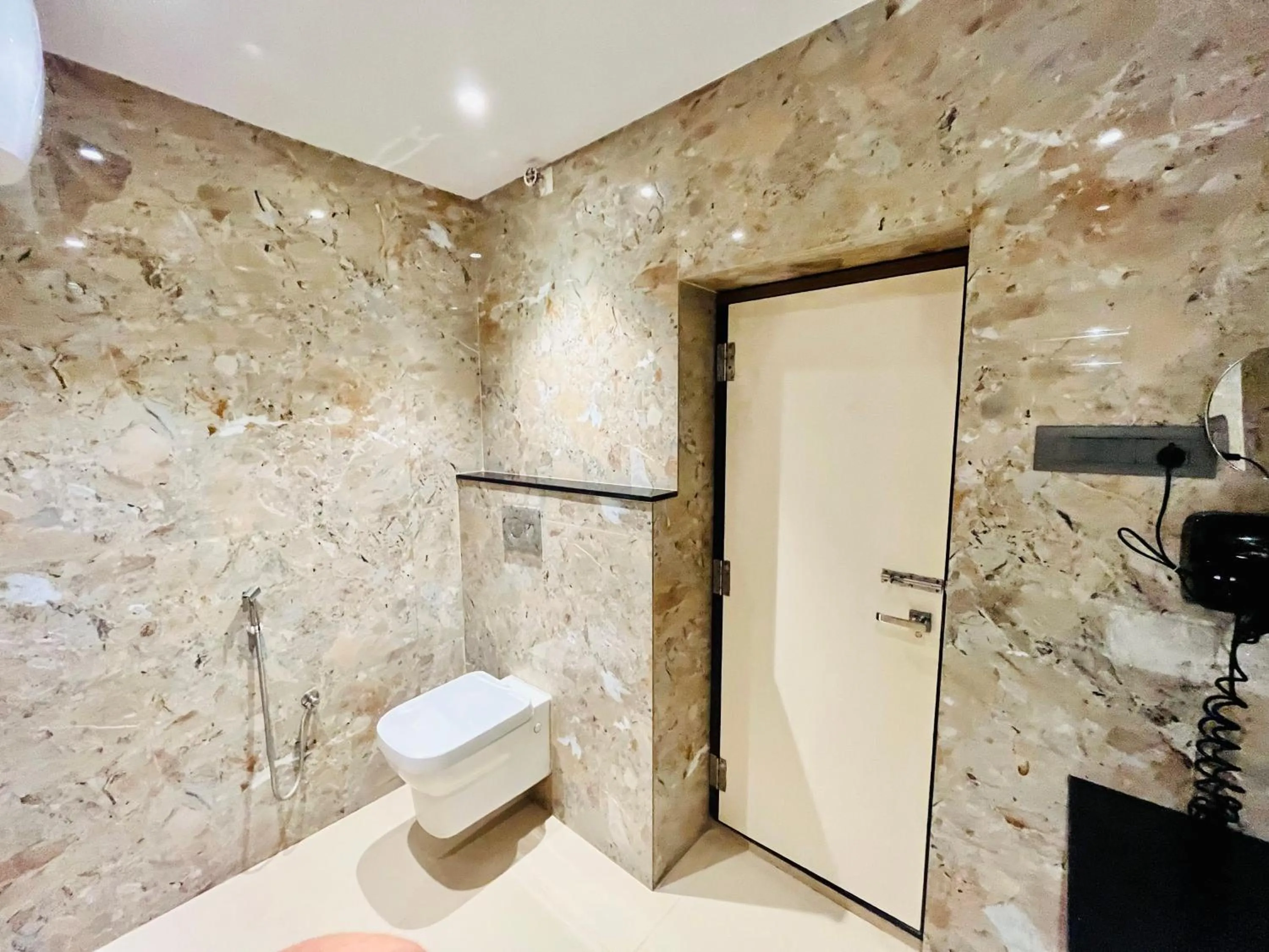 Shower in Shankar Bhavan By Vinayak Hotels