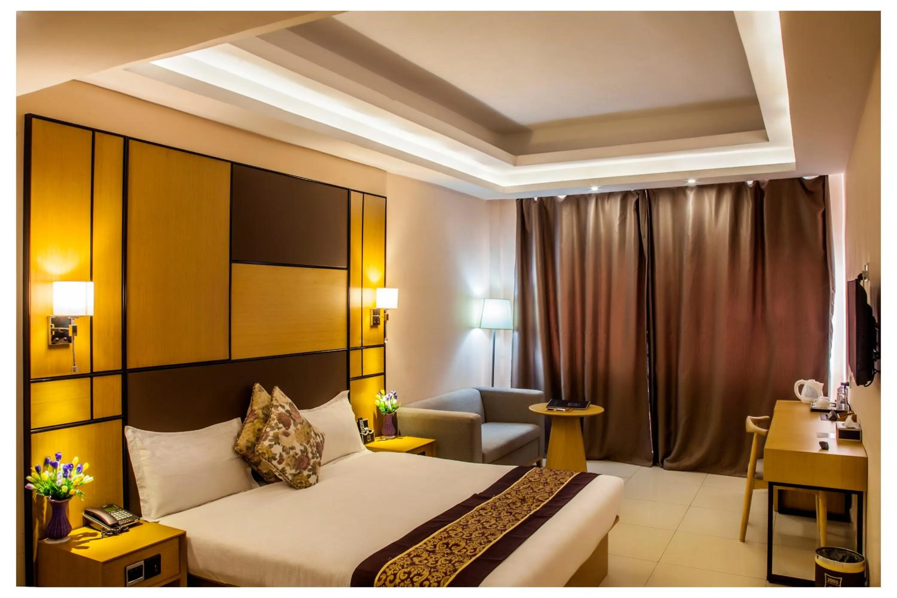 Bed in 2000 Hotel Downtown Kigali