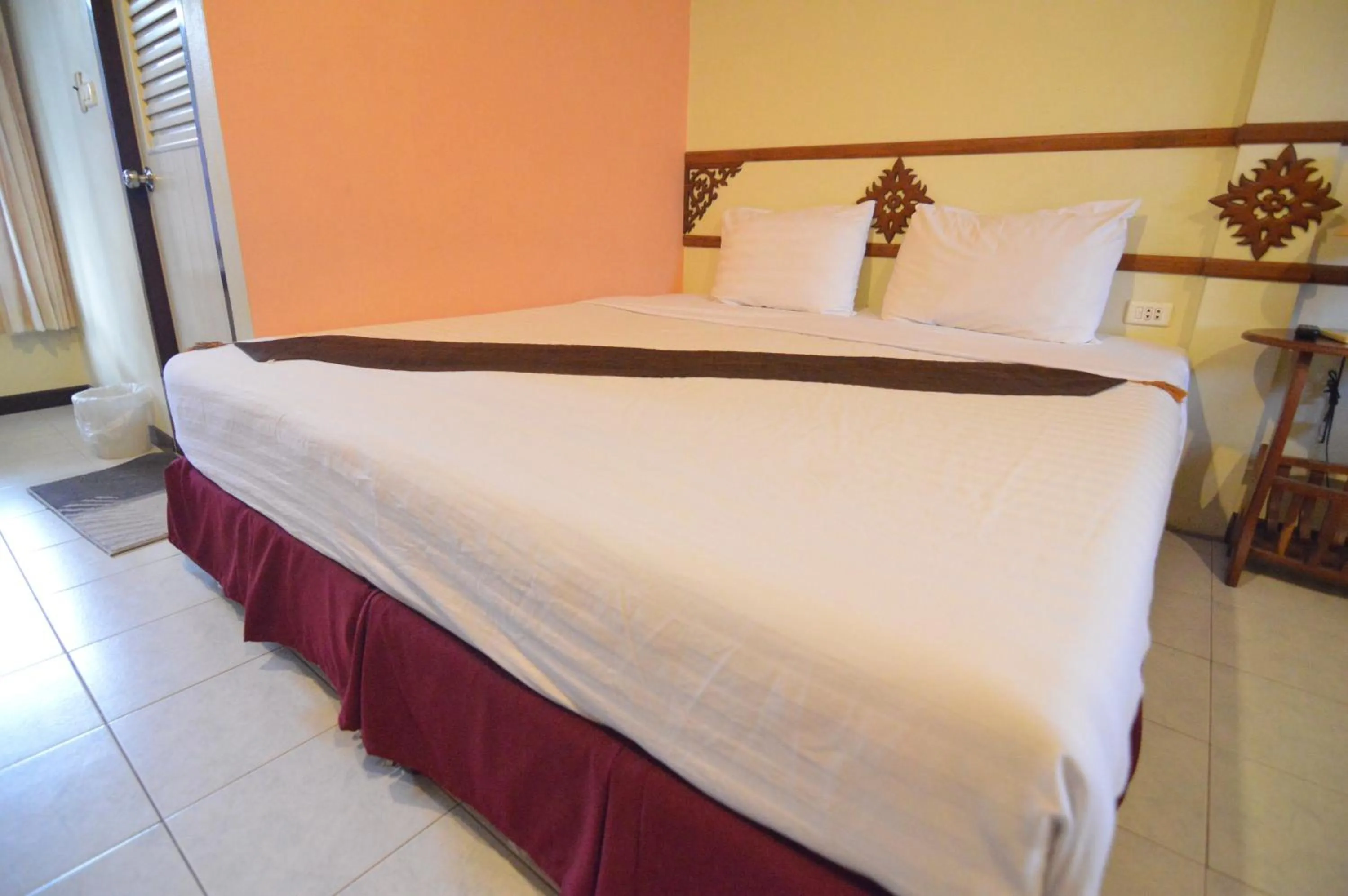 Bed in Techno Riverview Resort