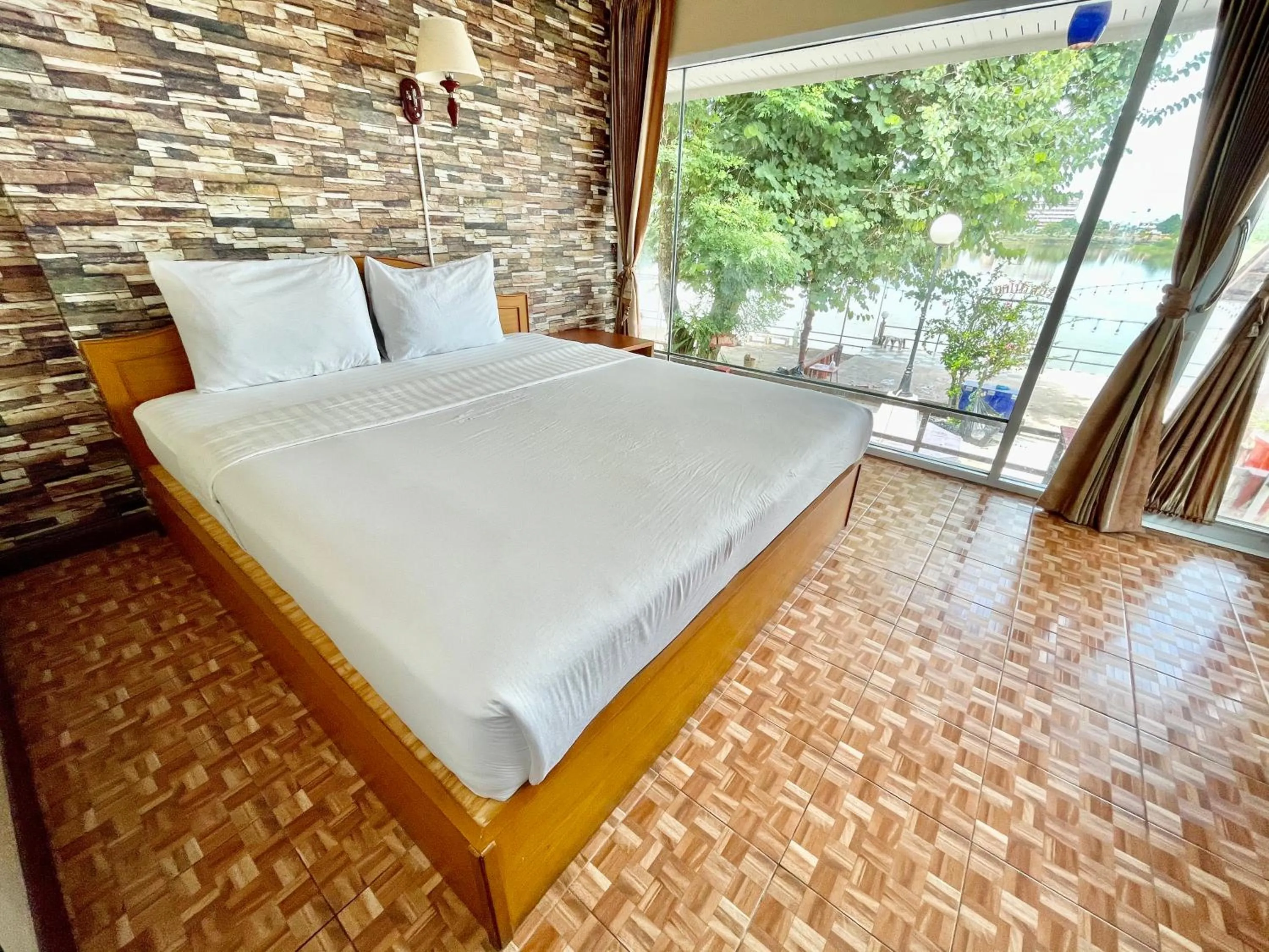 Bed in Techno Riverview Resort