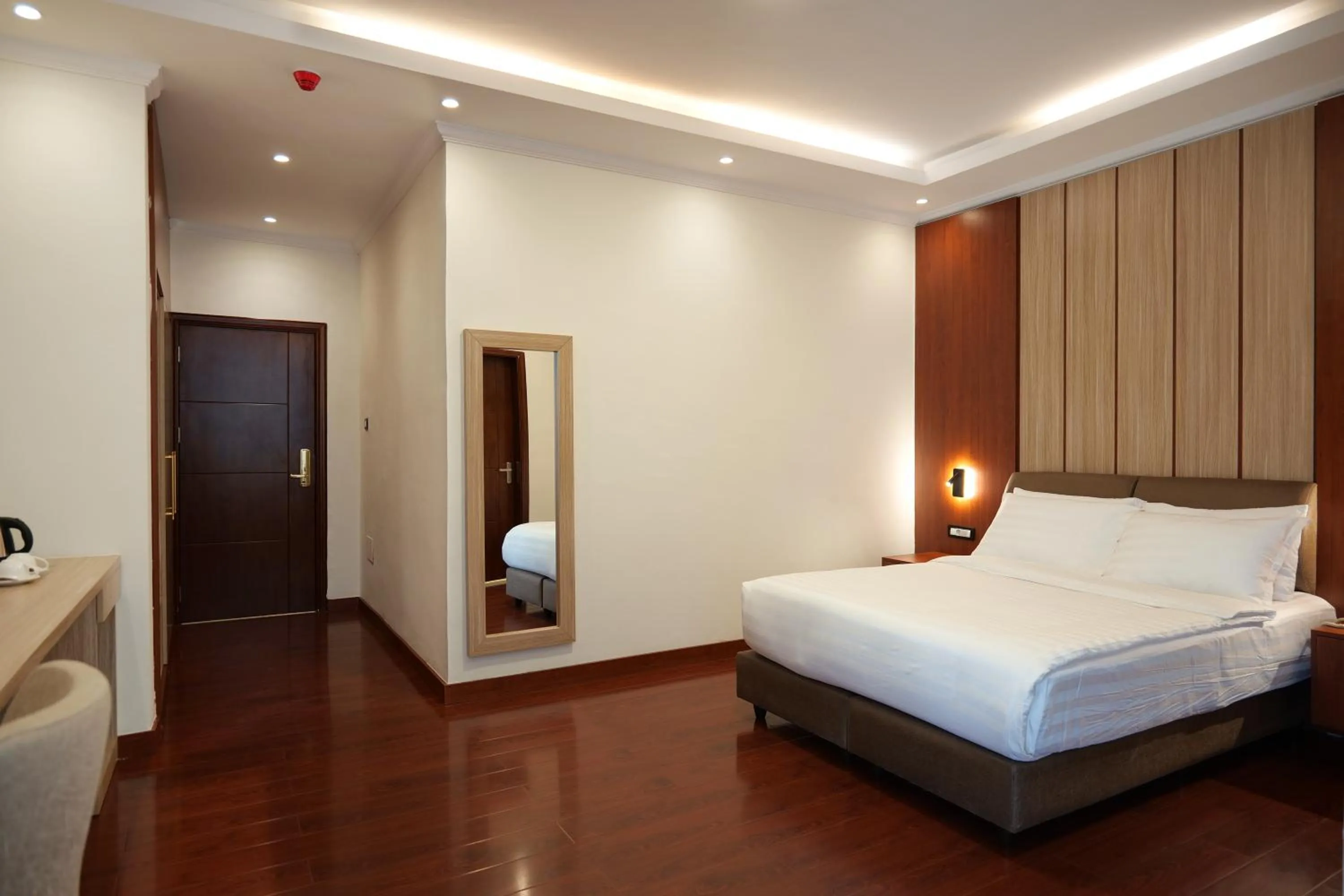 Bed in Crescent International Hotel