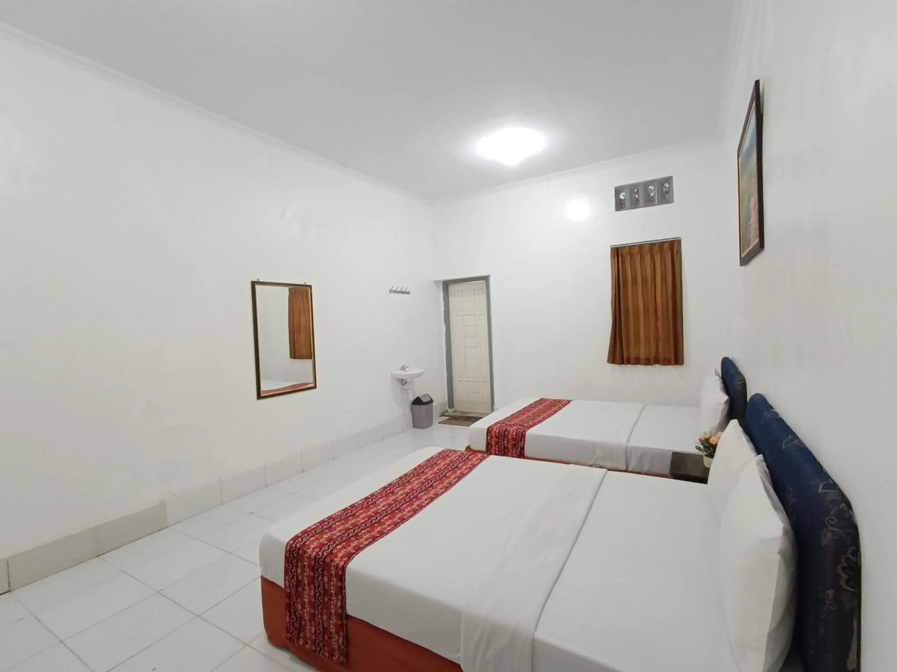 Bed in Hotel STIPRAM Kaliurang Yogyakarta