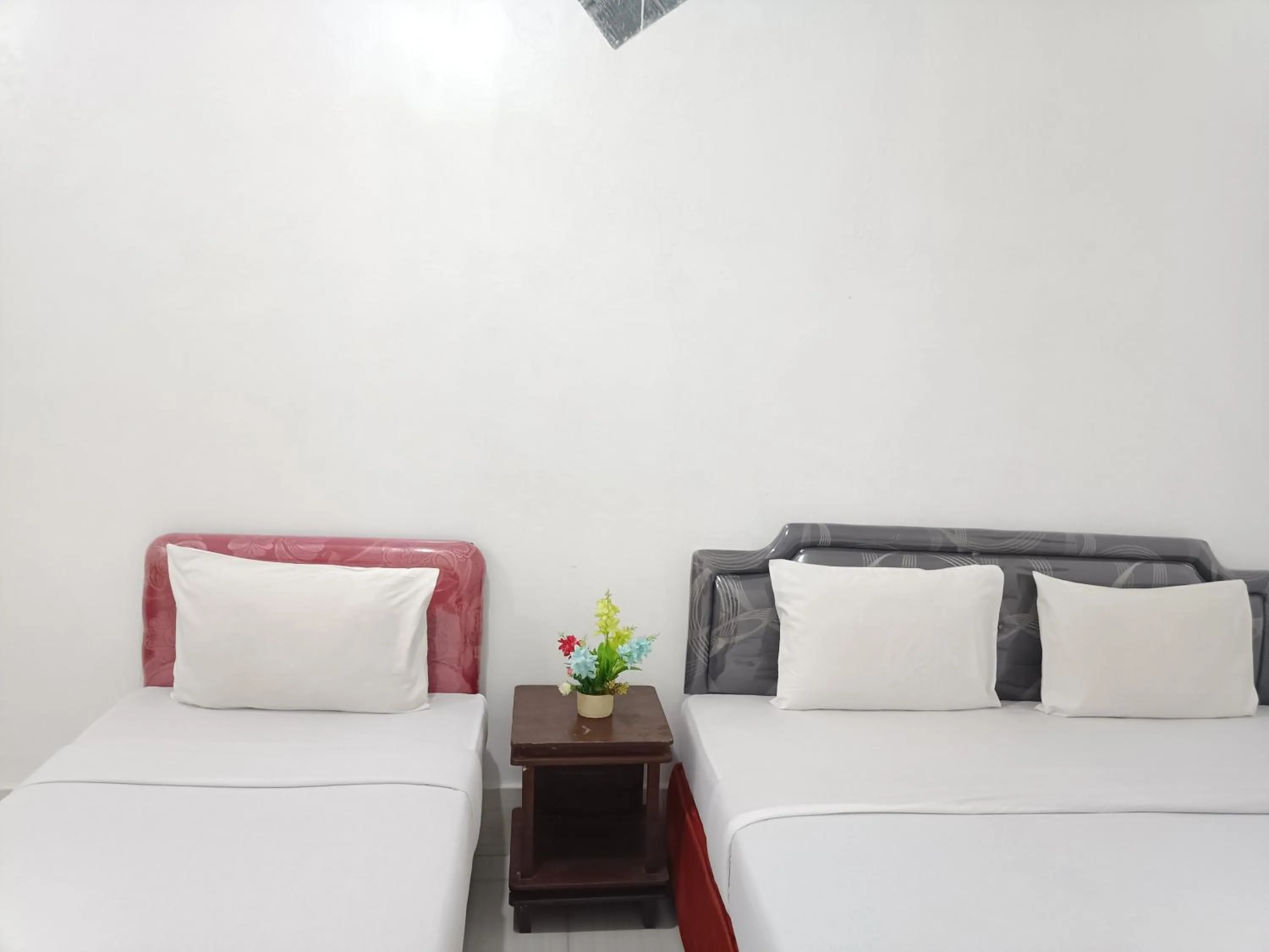 Bed in Hotel STIPRAM Kaliurang Yogyakarta