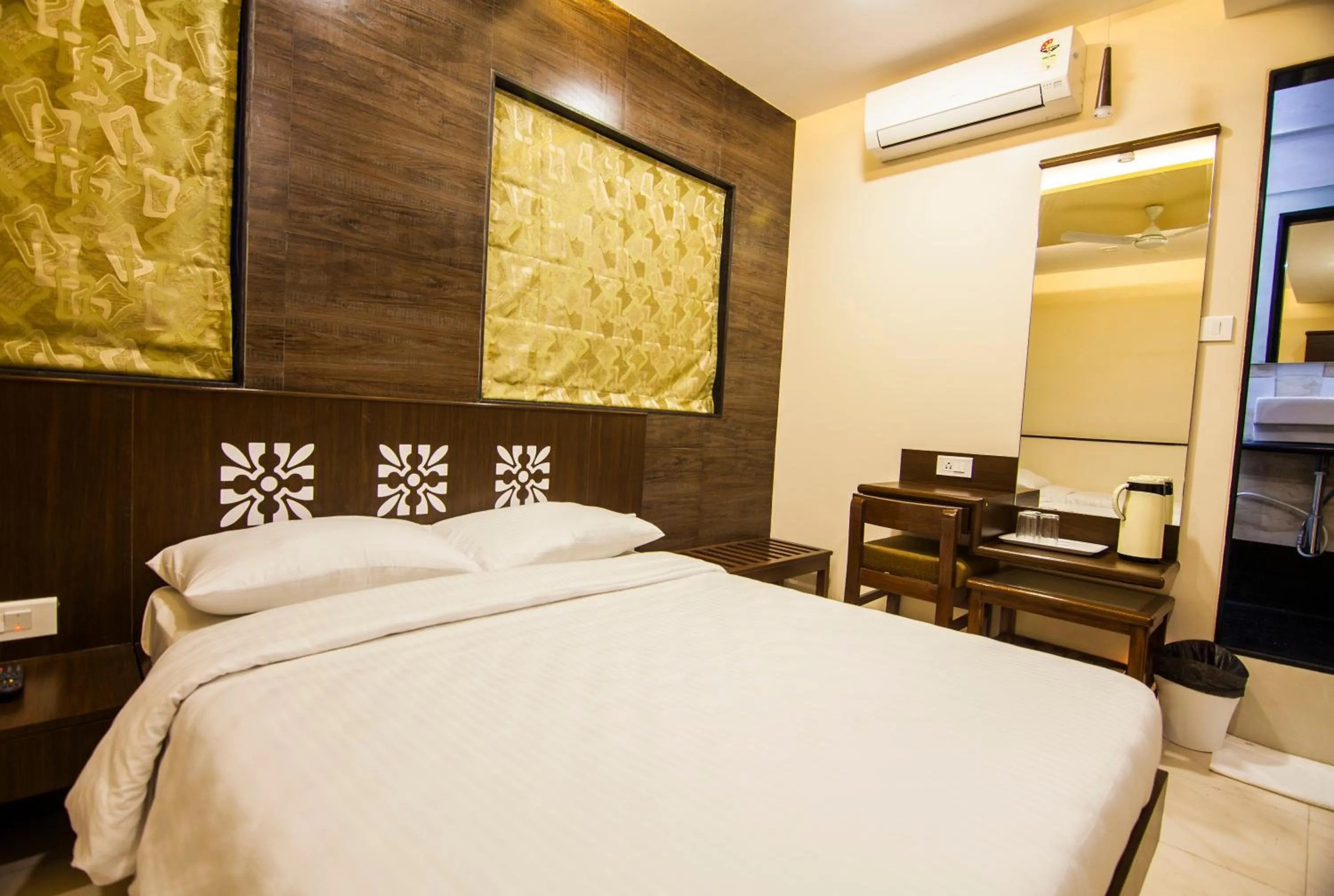 Photo of the whole room, Bed in City Guest House - Dadar