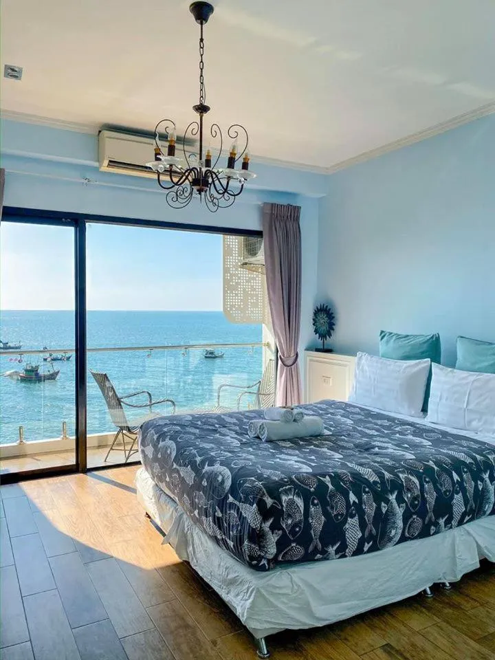 Bed in Sea Sand Trees