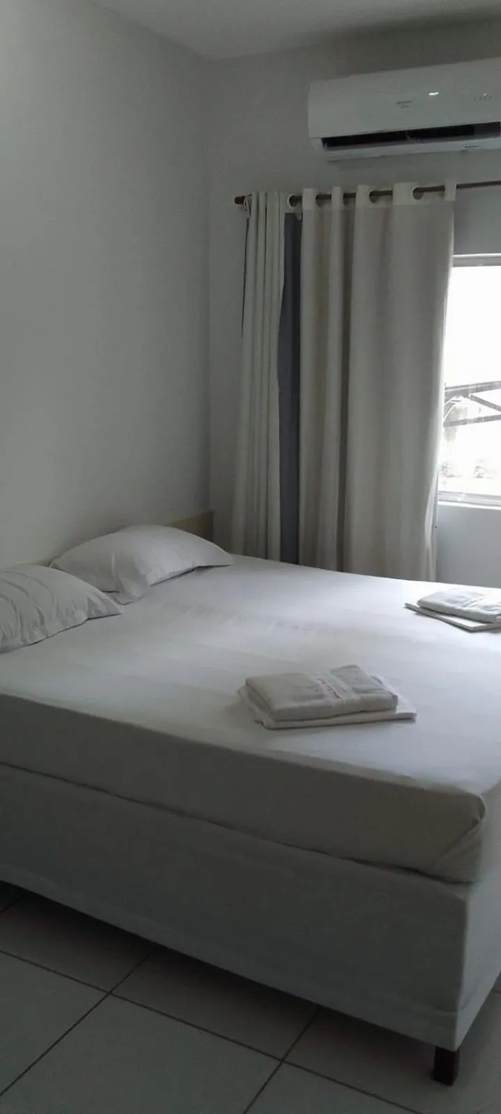 Bed in Nalu Beach Hotel pousada