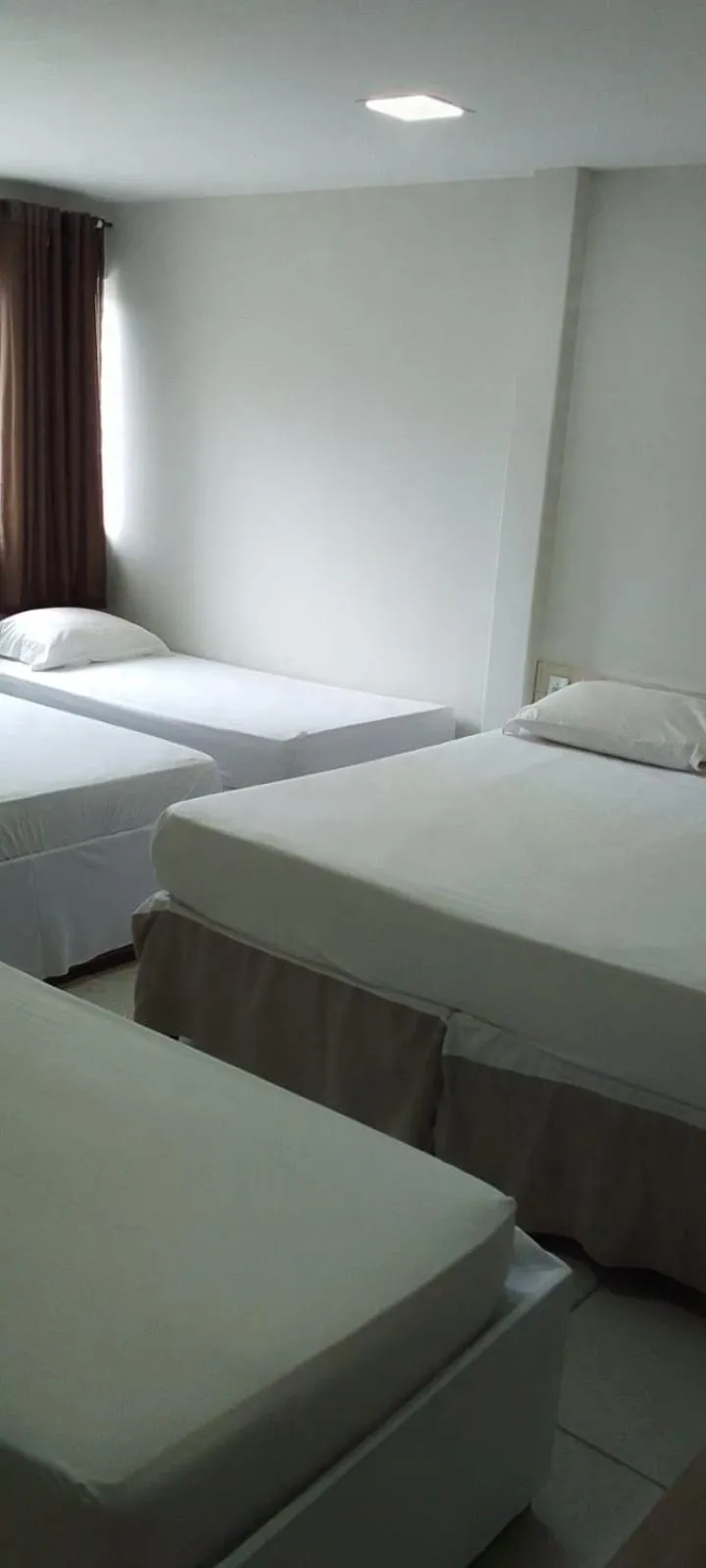 Bed in Nalu Beach Hotel pousada