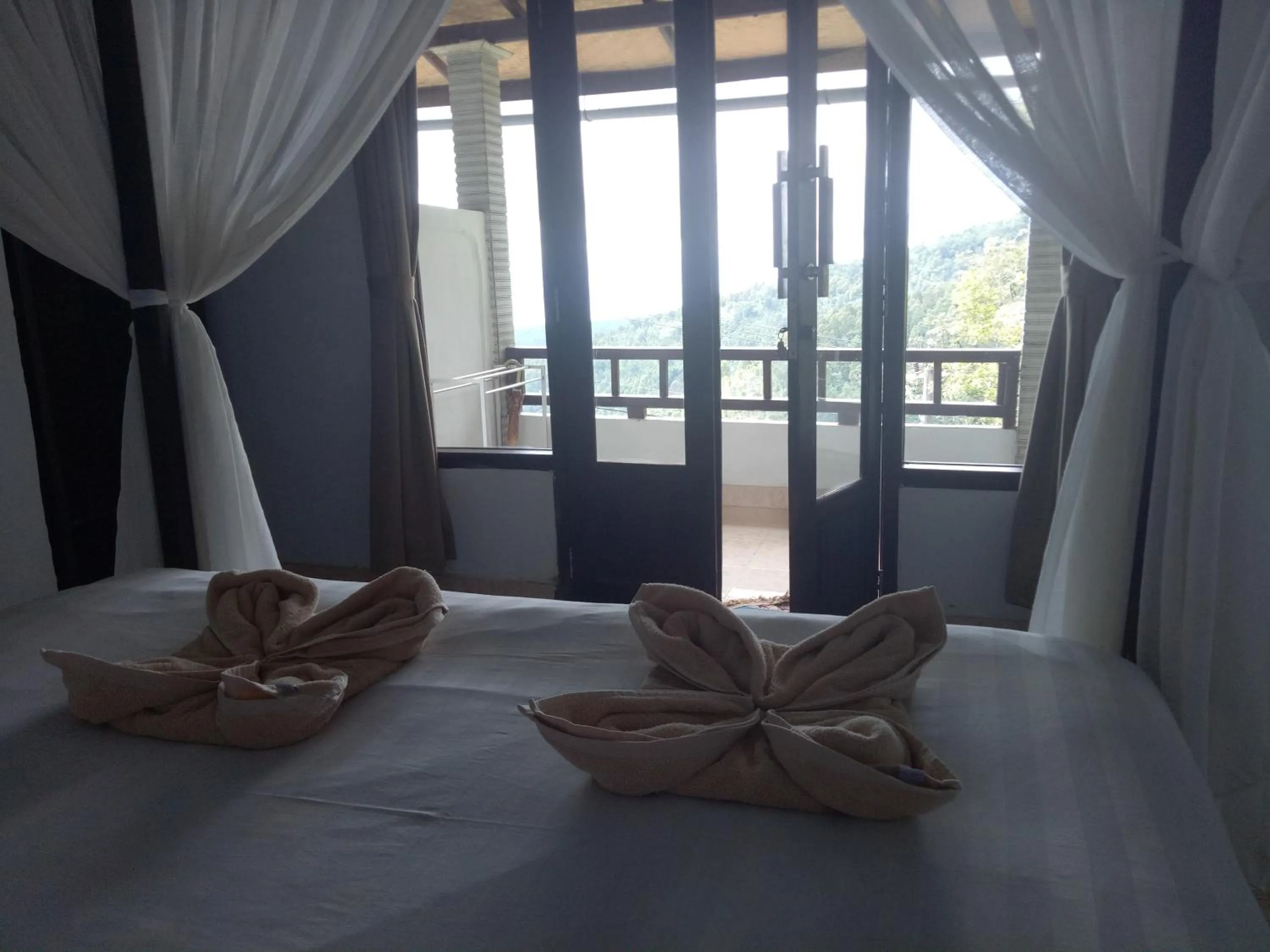 Bed in Puri Sunset Homestay