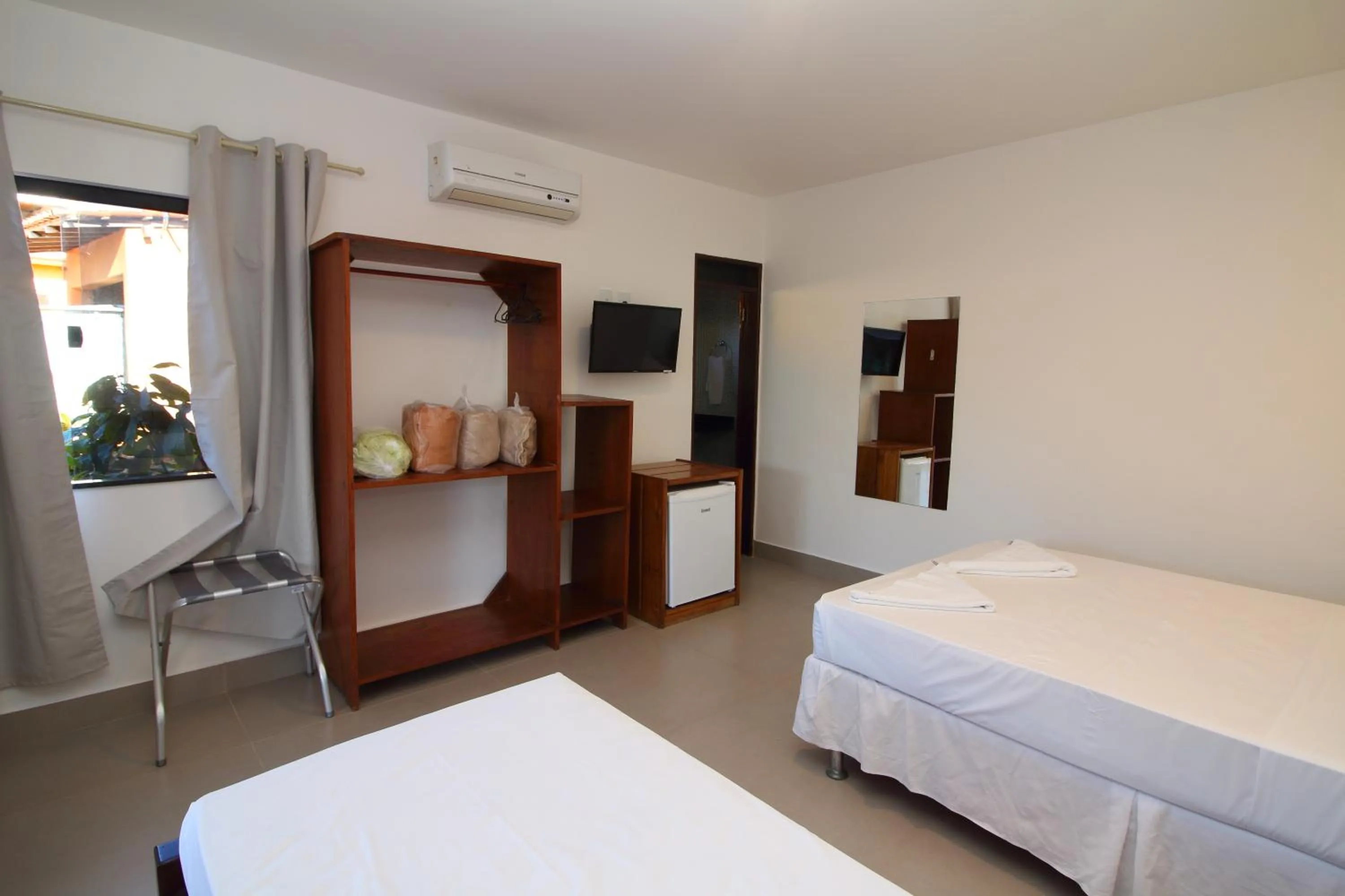 Bed in Pousada Manga Rosa- Arraial