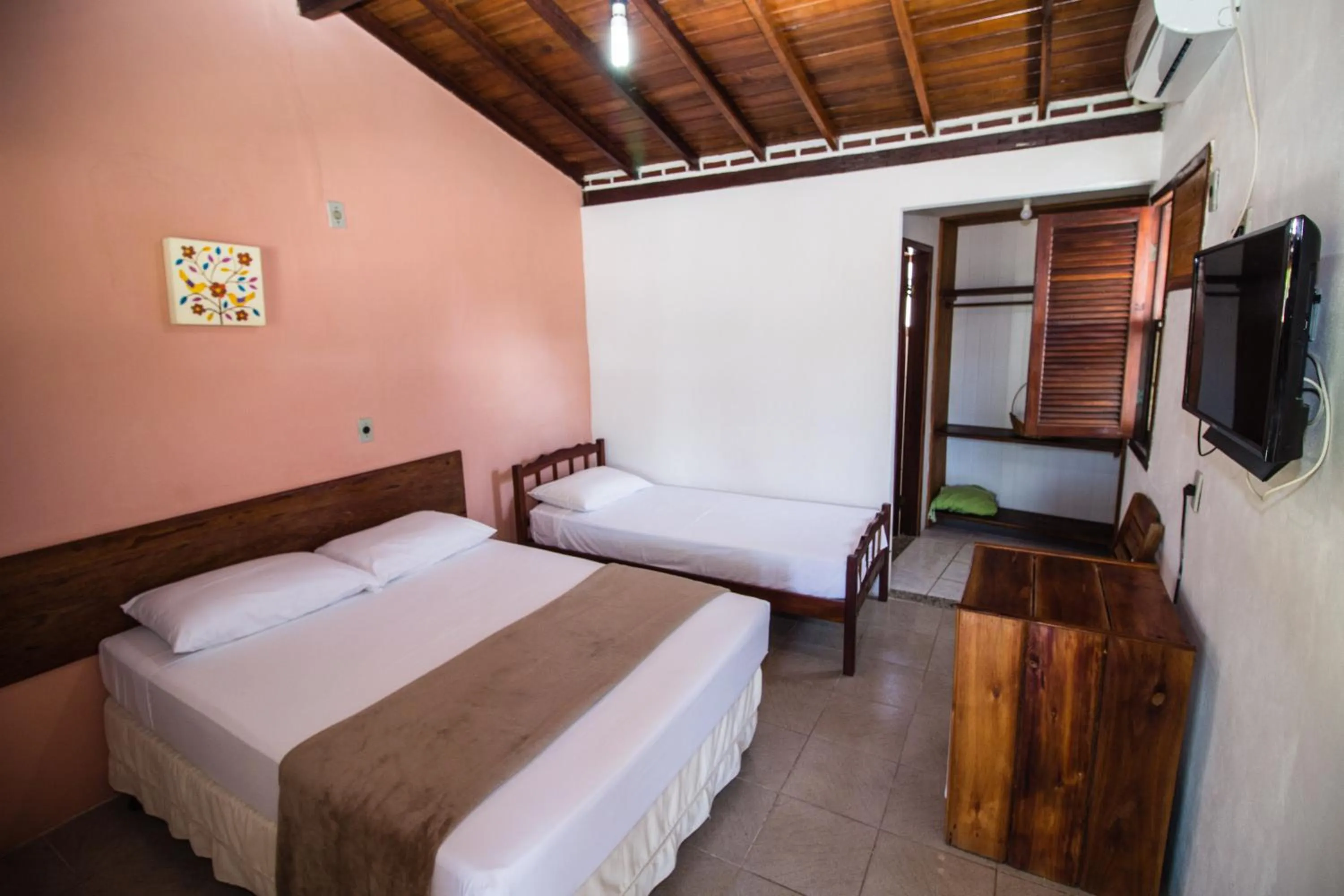 Bed in Pousada Manga Rosa- Arraial