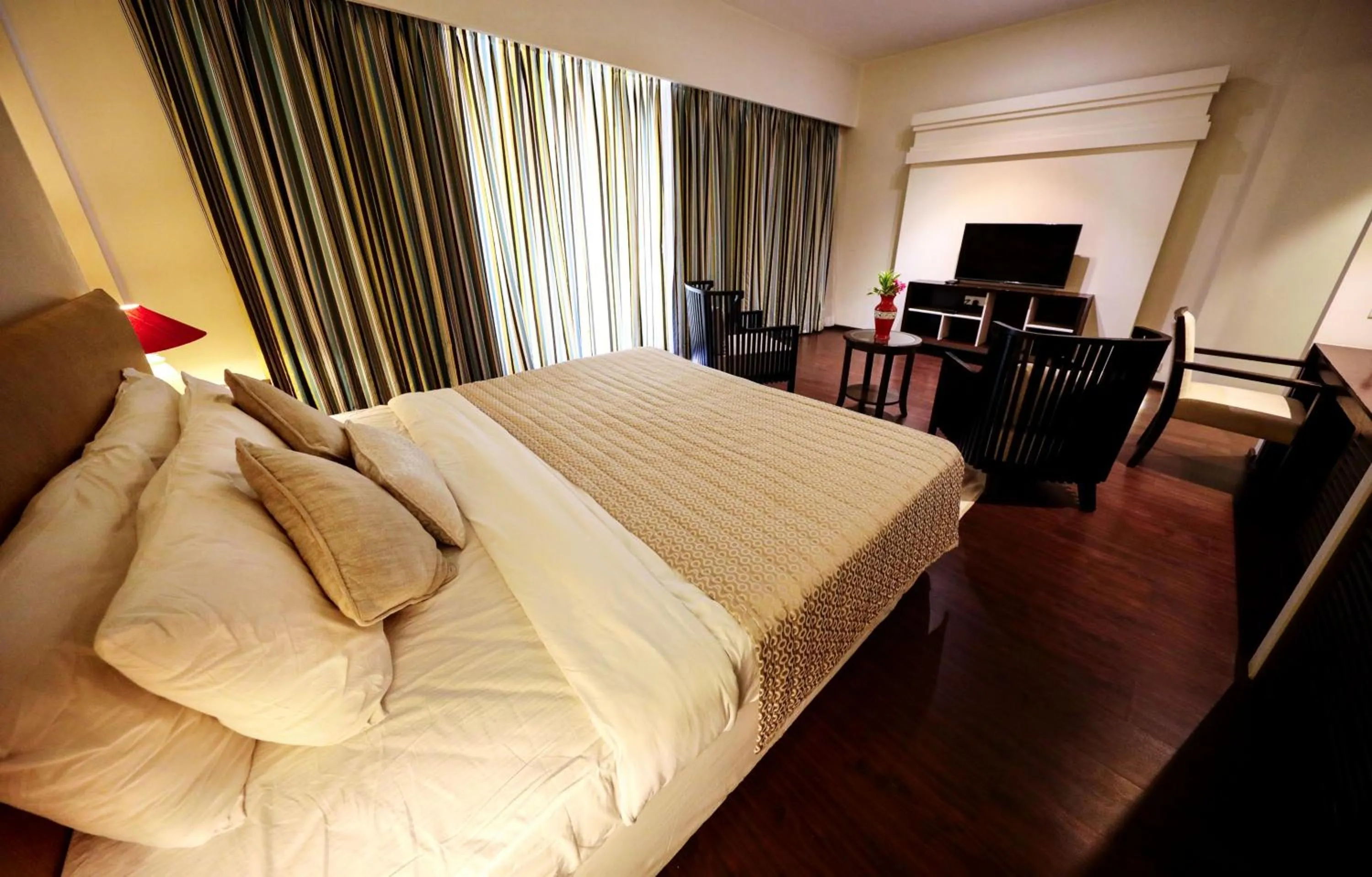 Photo of the whole room, Bed in Blue Ocean The Fern Resort & Spa Ganpatipule