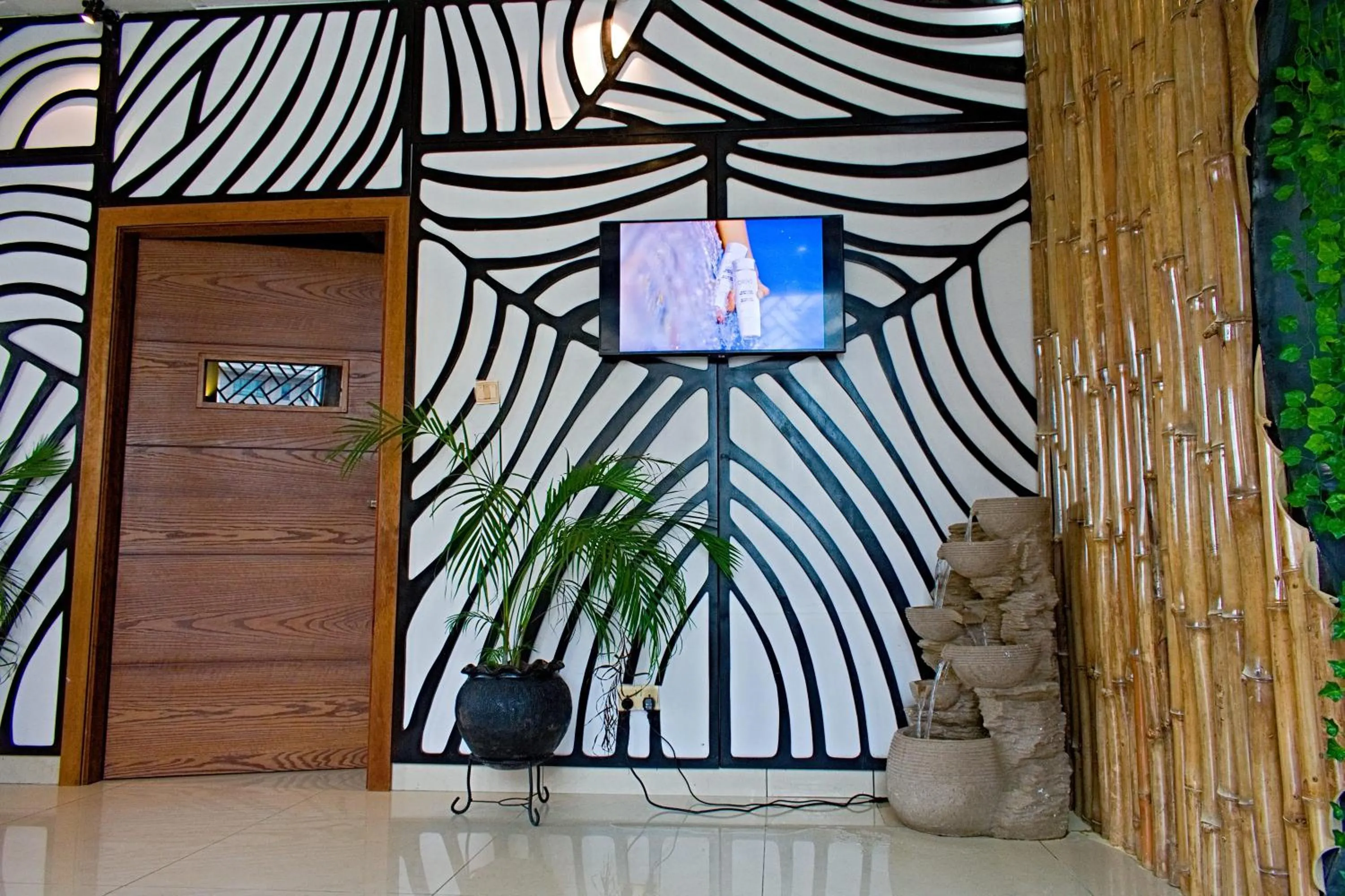 Communal lounge/ TV room in Lagos Oriental Hotel