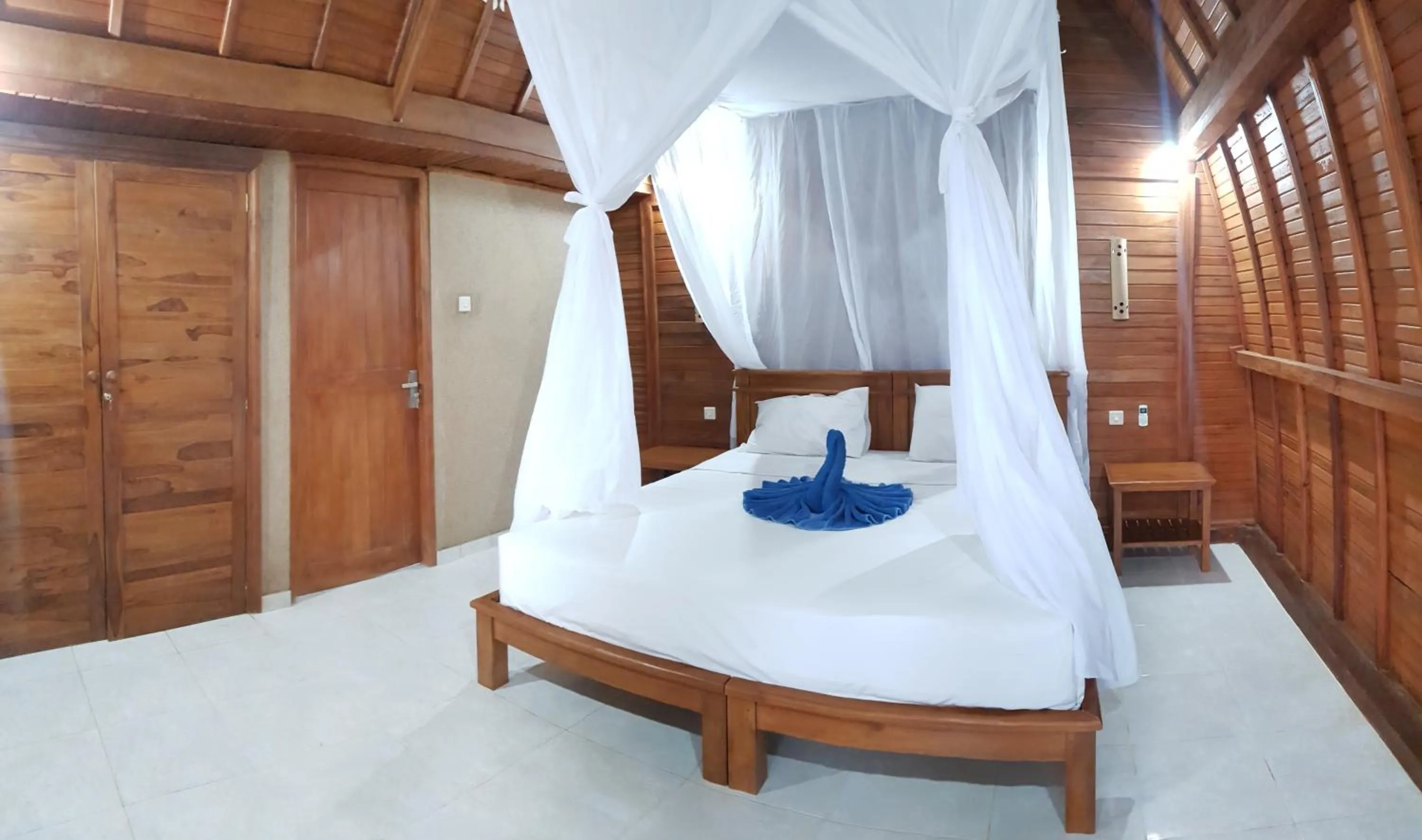 Bed in Mango Tree Inn