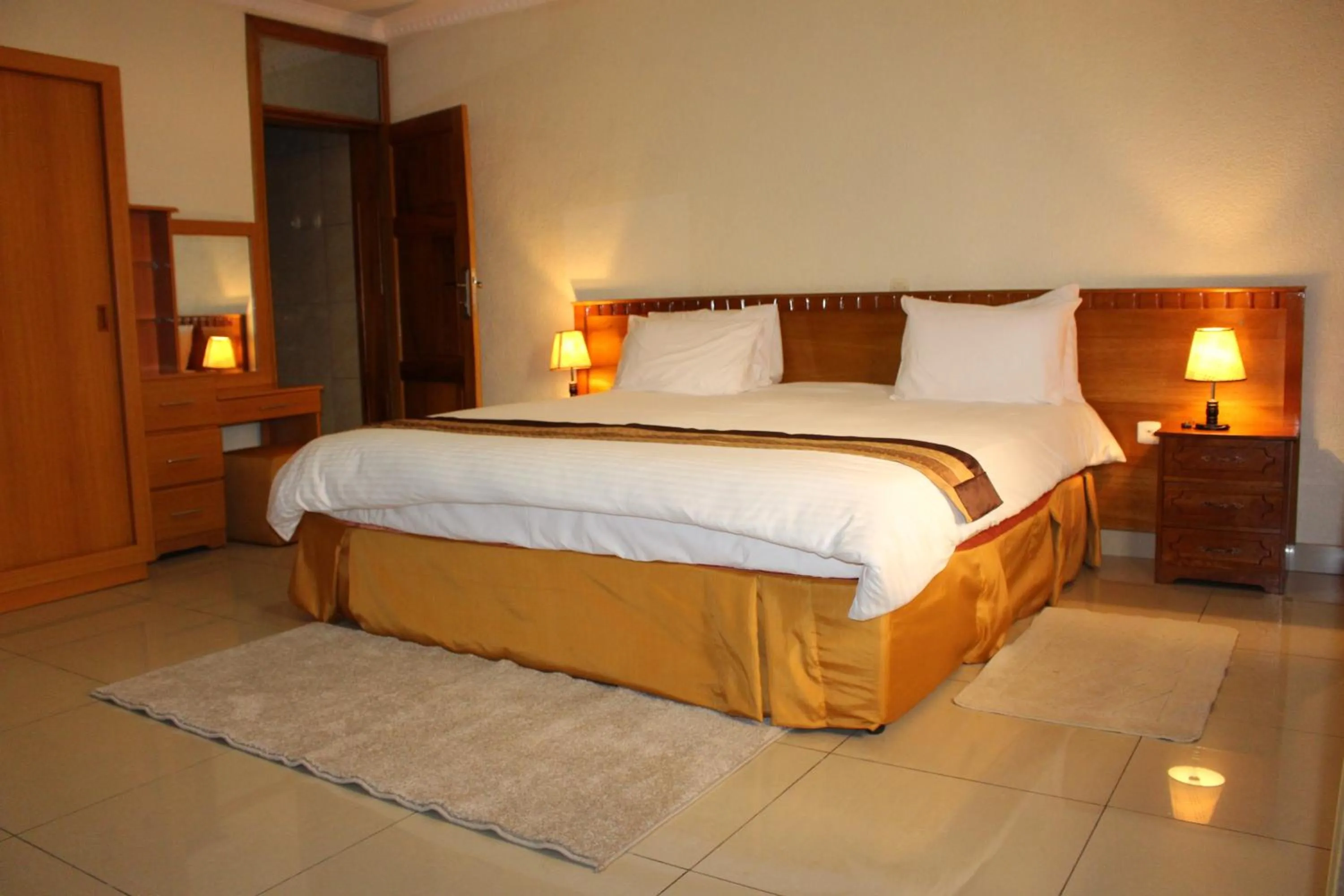 Bedroom, Bed in Virunga Hotel