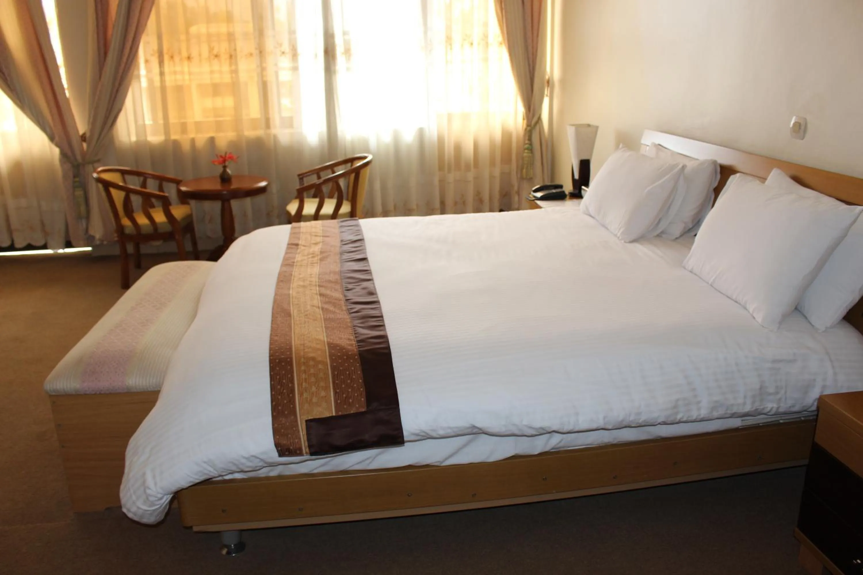 Bedroom, Bed in Virunga Hotel