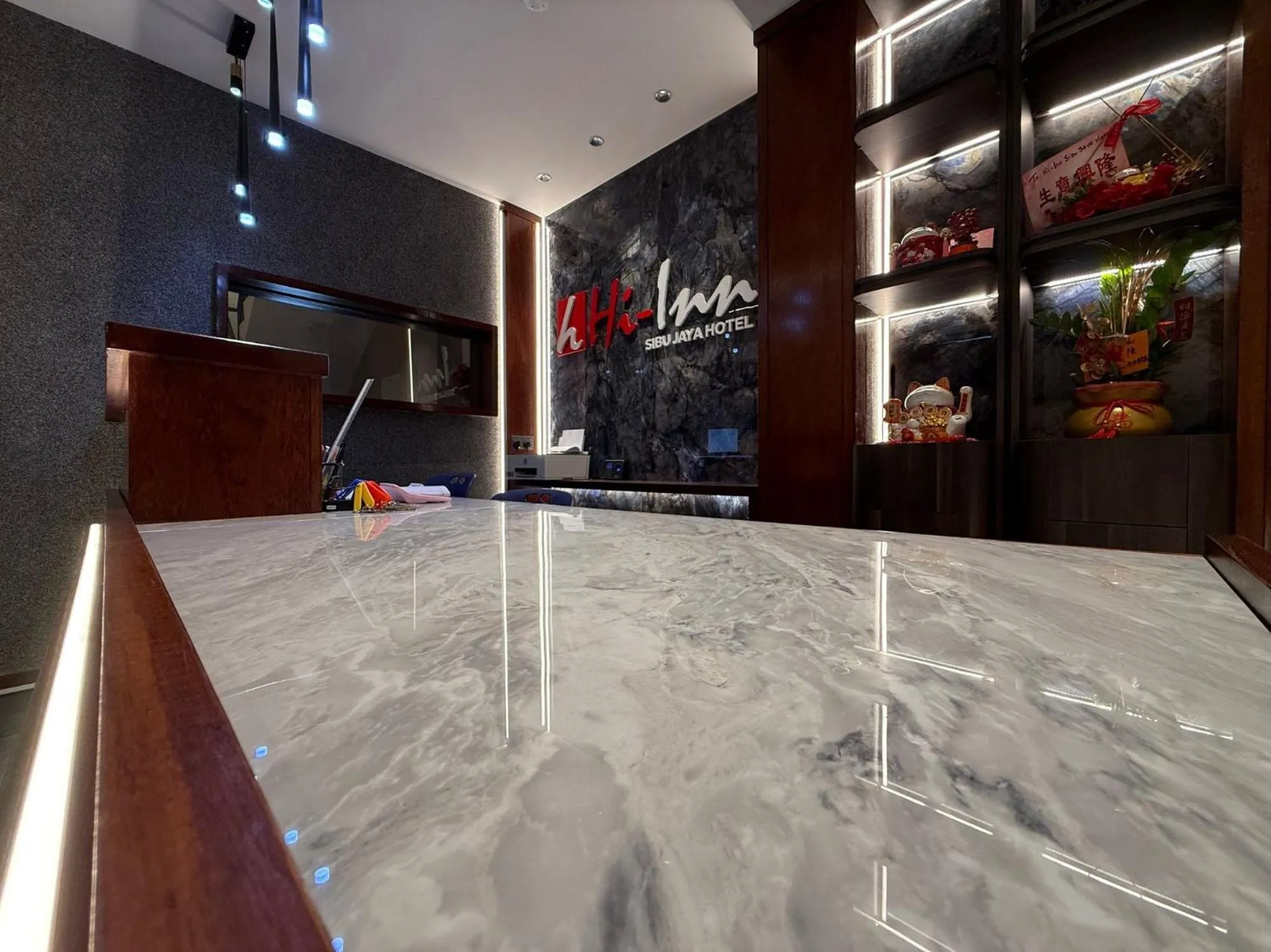 Lobby or reception in OYO 91193 Hi Inn Sibu Jaya