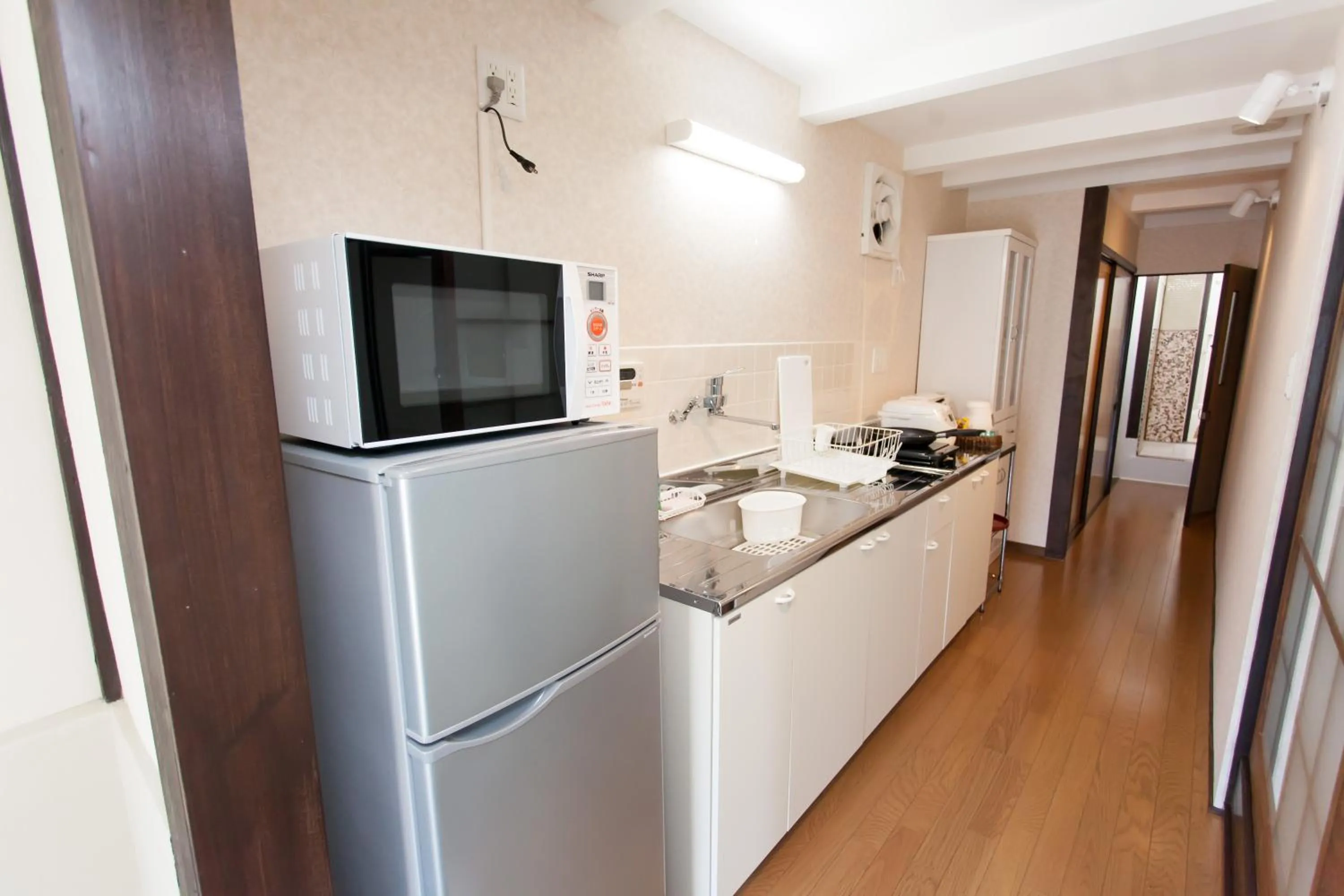 Kitchen or kitchenette in Kujo Stays