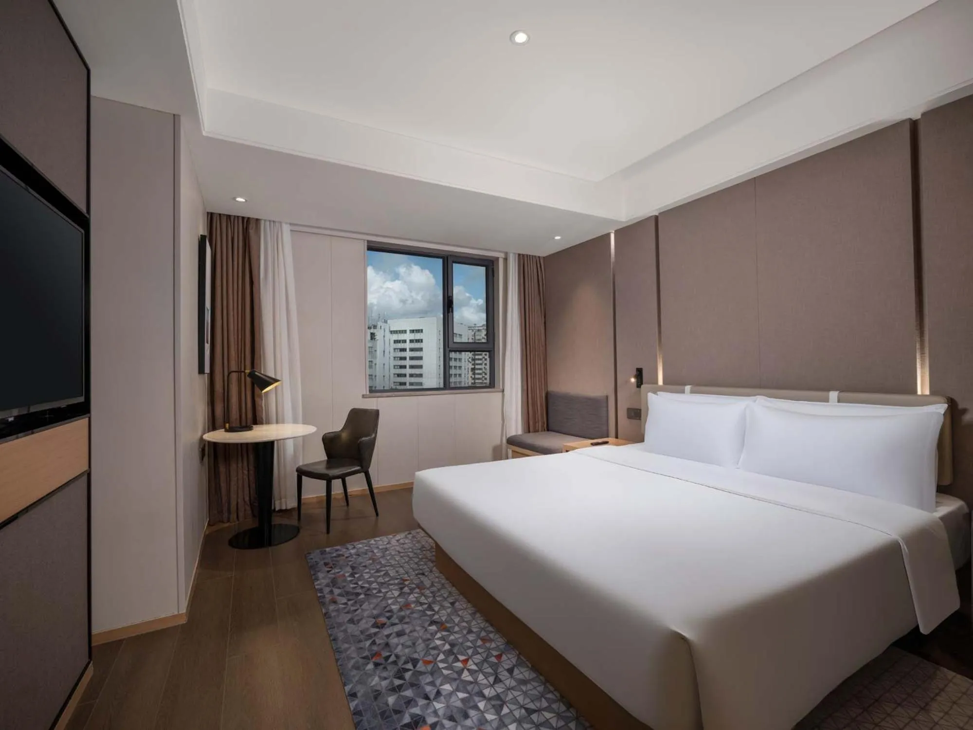Bed in Holiday Inn Express Zhuhai Grand Theater by IHG