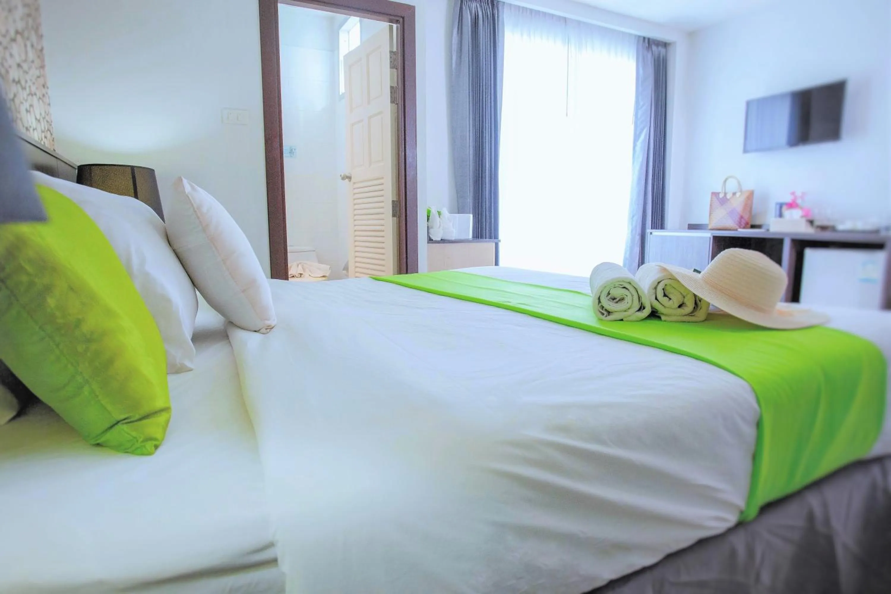 Bed in The Wings Boutique Hotels Krabi Ko Lanta