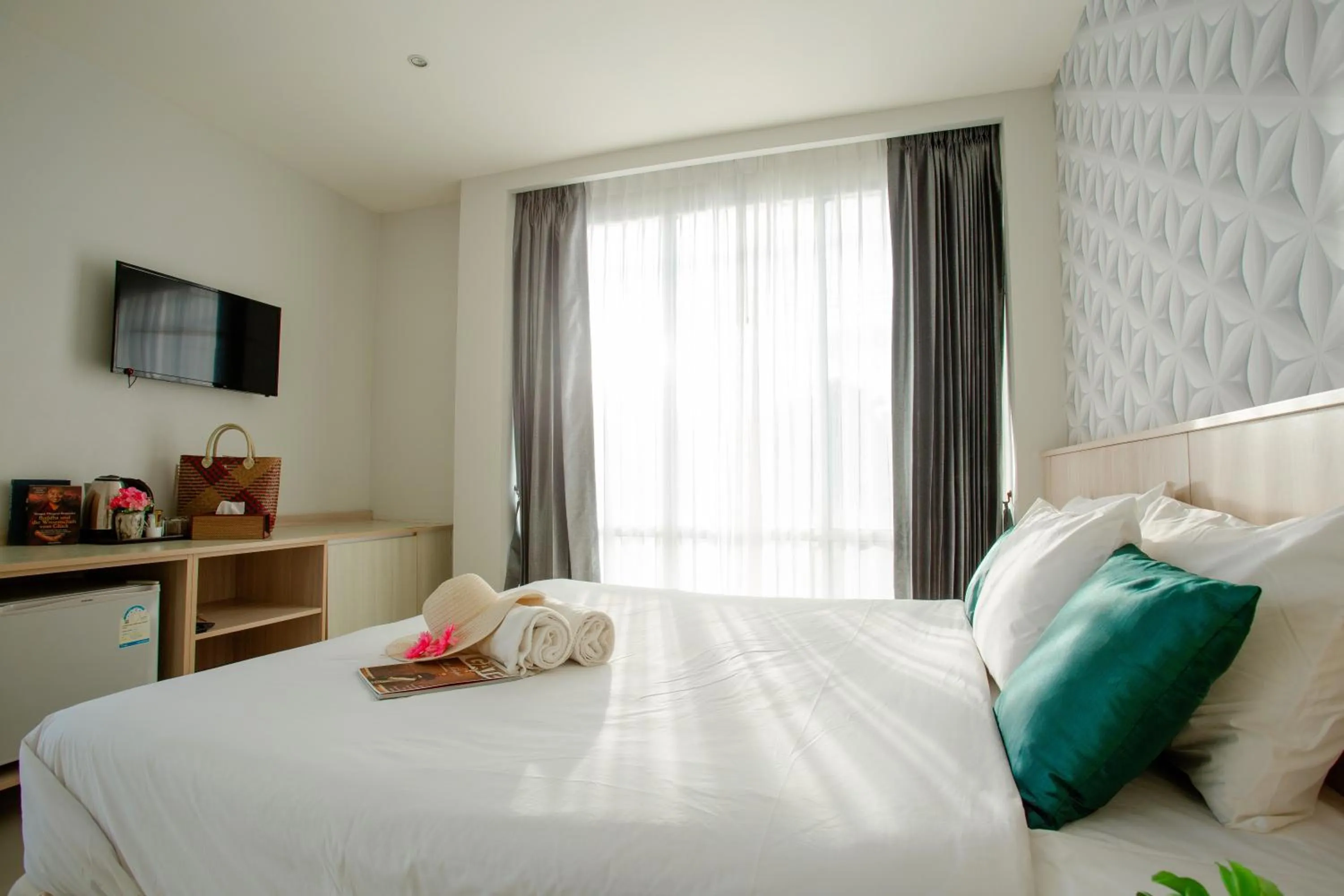 Bed in The Wings Boutique Hotels Krabi Ko Lanta