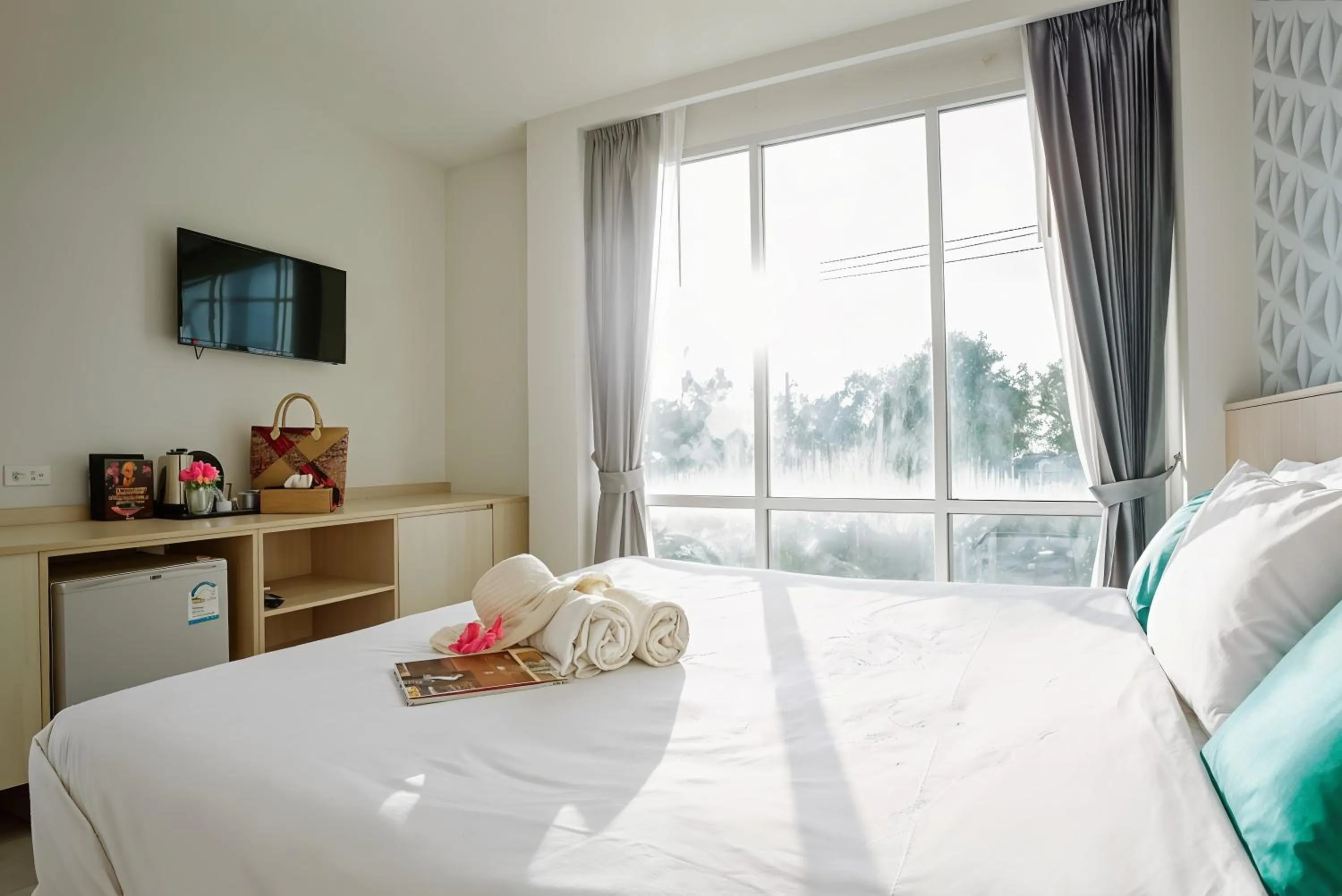 Bed in The Wings Boutique Hotels Krabi Ko Lanta